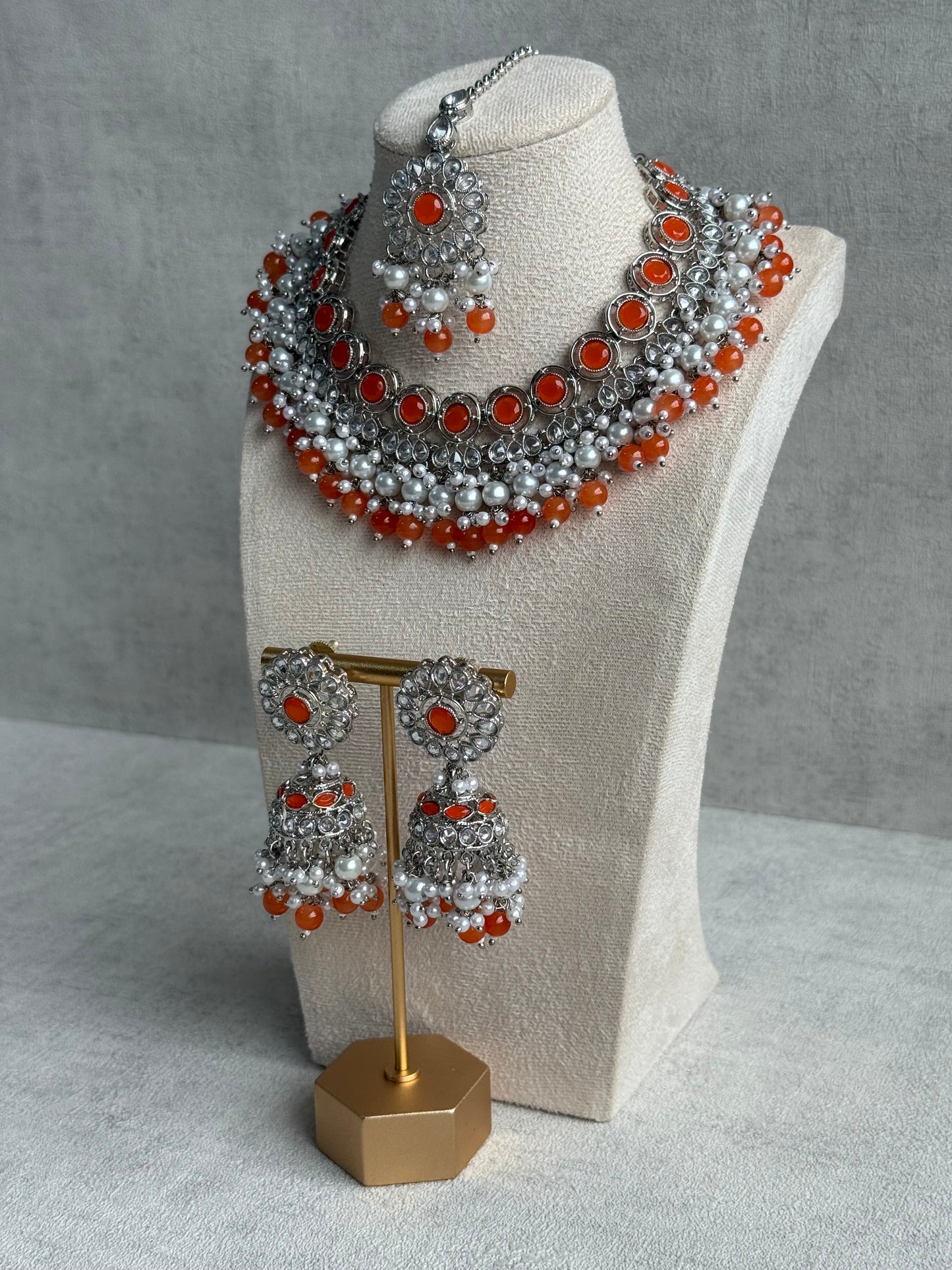Ayura Designs Barira Set – Necklace, Jhumkis & Tikka with Orange Stones, Pearls & Antique Silver Finish