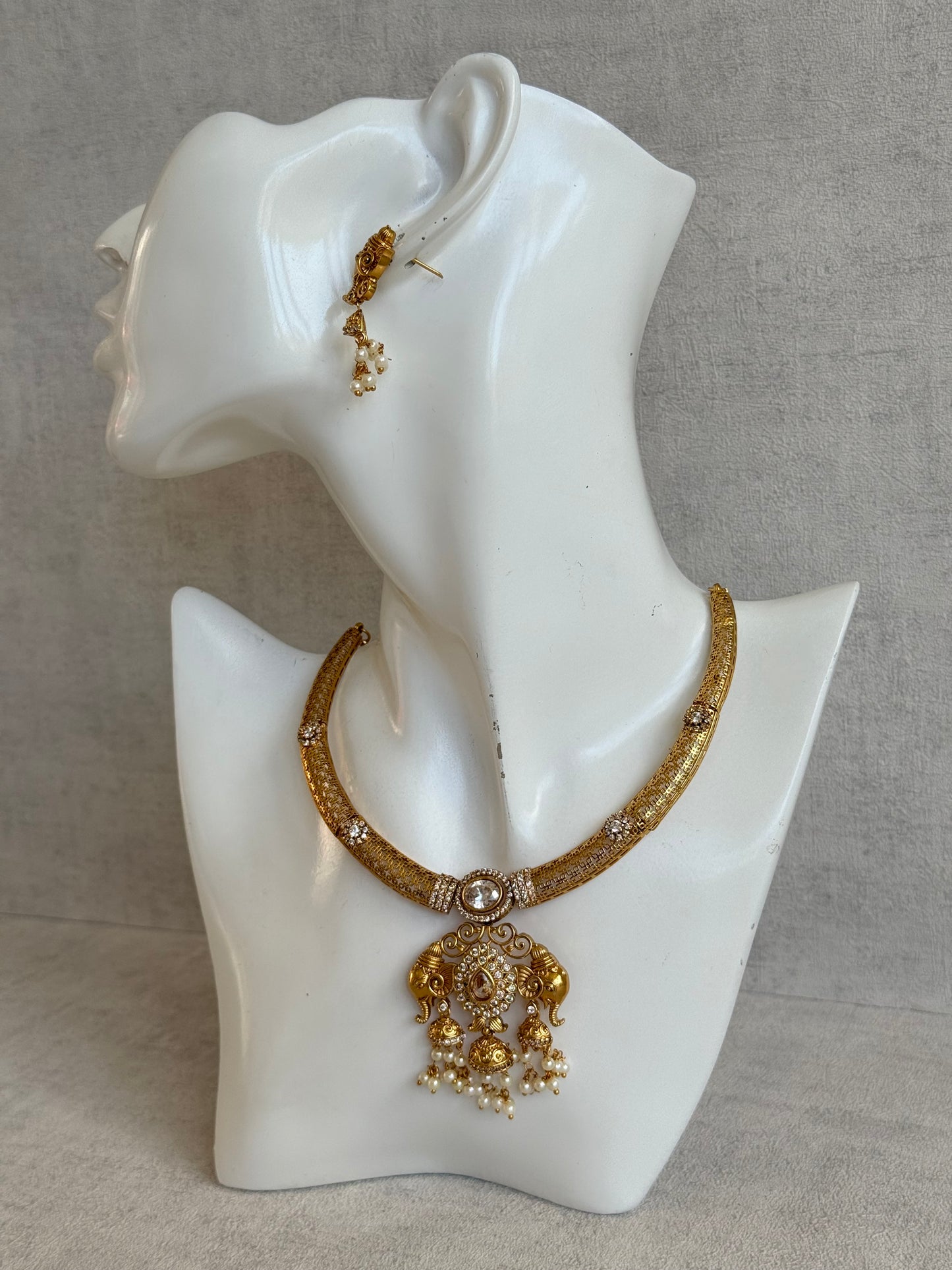 Ayura Designs Wadha Collar Necklace Set with Earrings – Gold Elephant Pendant & White Crystal Detailing