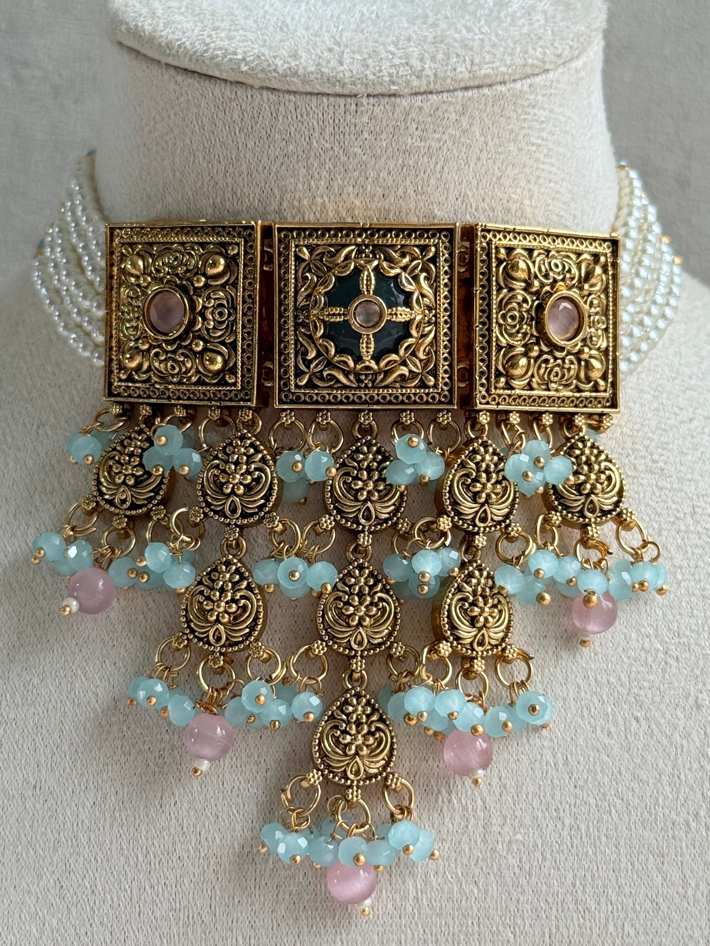 Ayura Designs Samera Choker Set with Earrings & Tikka – Aqua Blue & Blush Pink Beads, Green Centre Stone, Floral Motifs & Antique Gold Finish