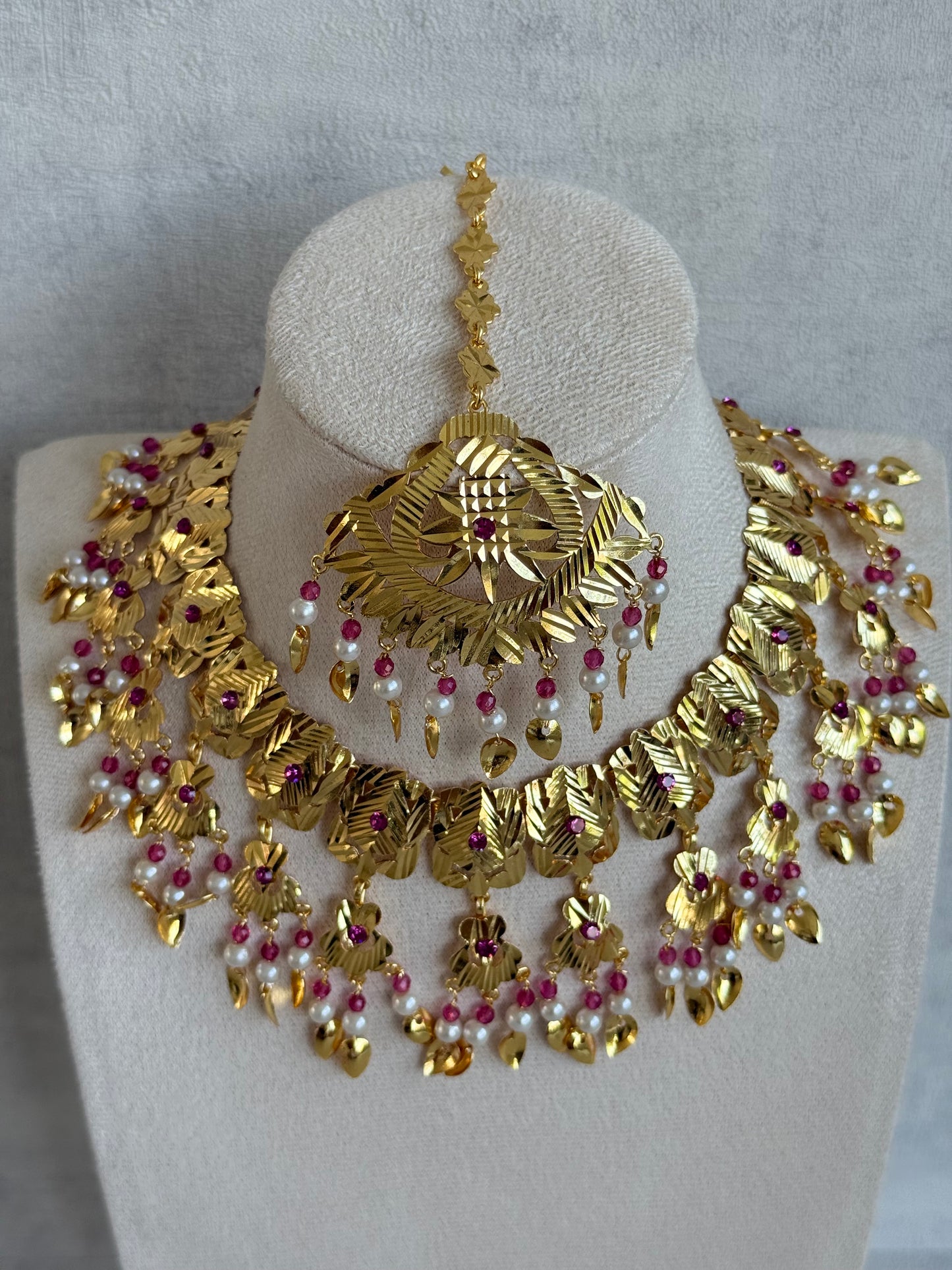 Ayura Designs Baisakhi Set with Earrings & Tikka – Gold Pipal Patti Design with Ruby Pink Beads & Pearl Detailing