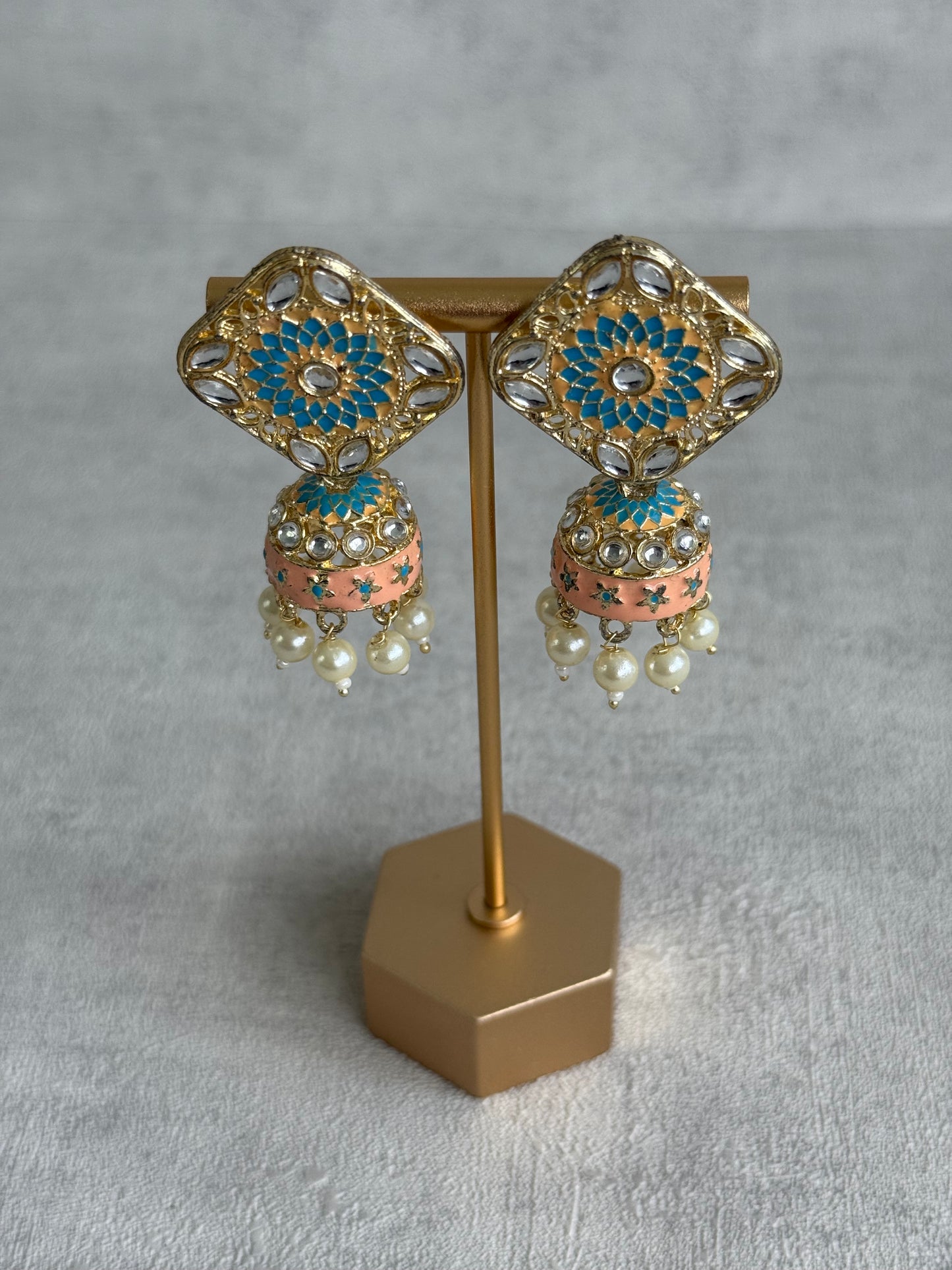 Ayura Designs Rangoli Jhumkis – Aqua Blue & Peach Meenakari with Pearl Drops in Antique Gold Finish