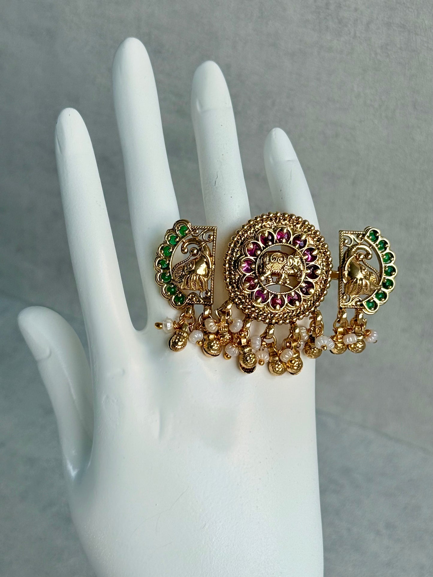 Ayura Designs Nira Adjustable Ring – Jadau-Inspired Gold Elephant Motifs with Rani Pink & Emerald Green Stones, Pearl Drops & Ghungroos