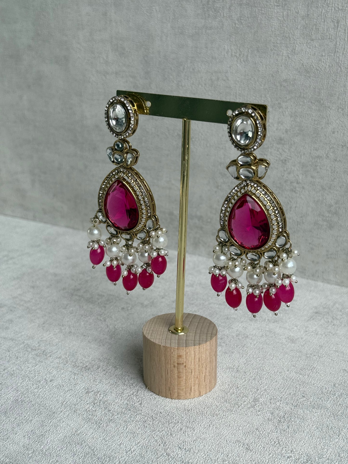 Ayura Designs Nageen Earrings – Antique Gold Jhumkis with Hot Pink Stones, Mirror-Cut Accents & Pearl Drops