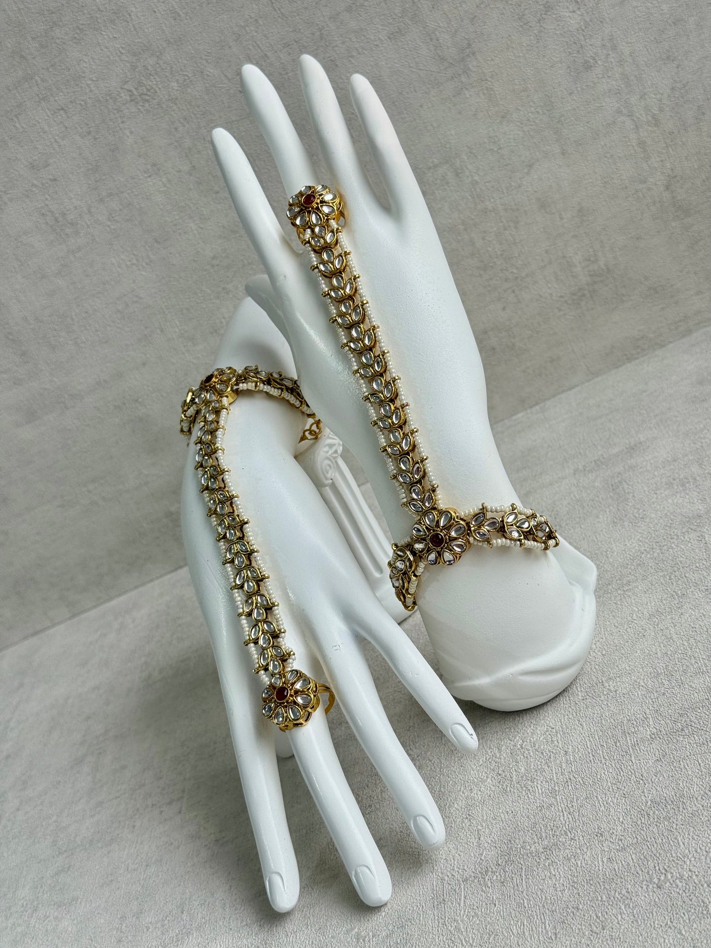 Ayura Designs Ruya Haathphool – Mirror-Cut Stones with Ruby Accents & Pearl Detailing