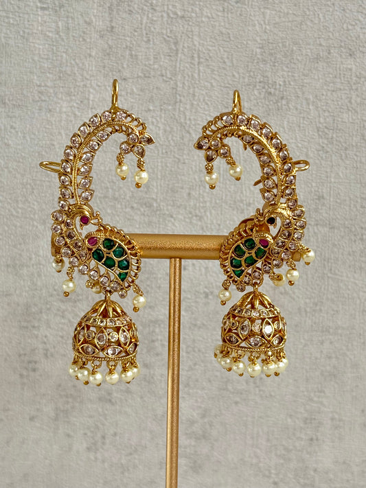 Ayura Designs Padma Earrings – Gold Half Ear Cuffs with Peacock Motif, Pink & Green Stone Accents, Kundan Crystals & Pearl Jhumka Drops