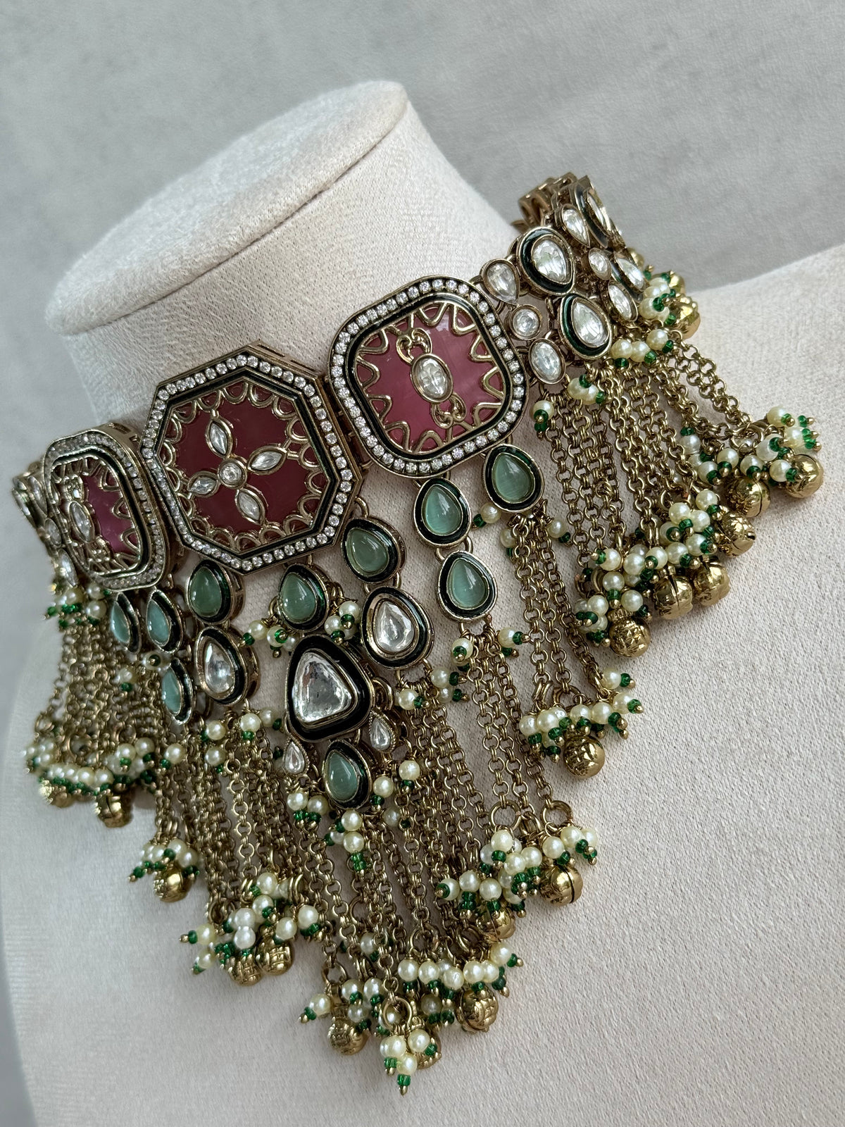 Ayura Designs Ashna Choker Set with Tikka and Earrings – Rose Pink, Mint Green & Kundan with Chains & Ghungroos in Antique Gold Finish