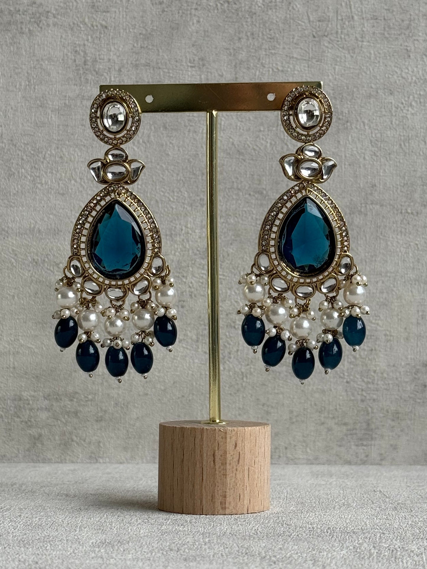 Ayura Designs Nageen Earrings – Antique Gold Jhumkis with Ink Blue Stones, Mirror-Cut Detailing & Pearl Drops