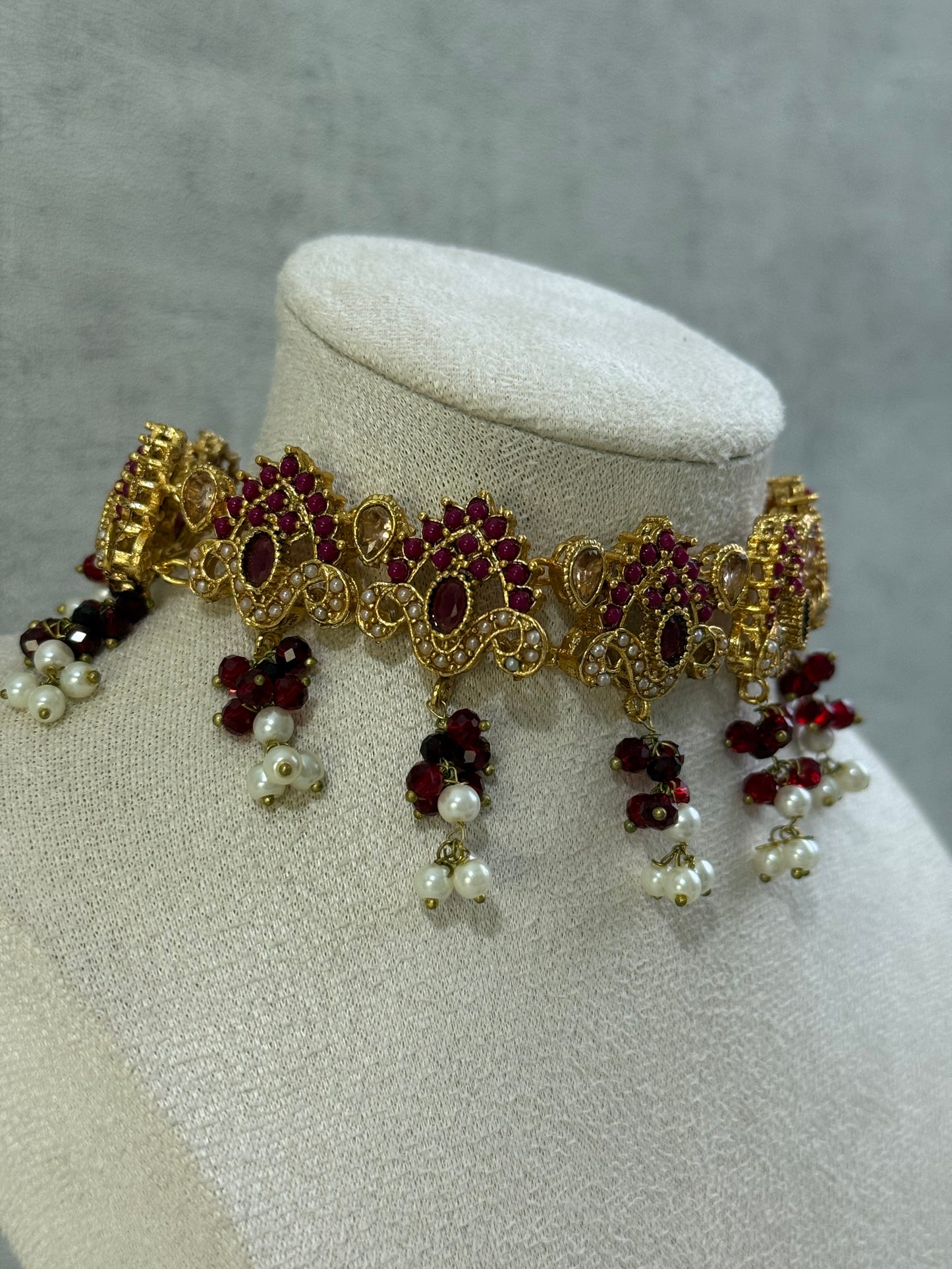 Ayura Designs Noor Set – Choker, Jhumkis with Sahare & Tikka in Maroon with Pearl Detailing