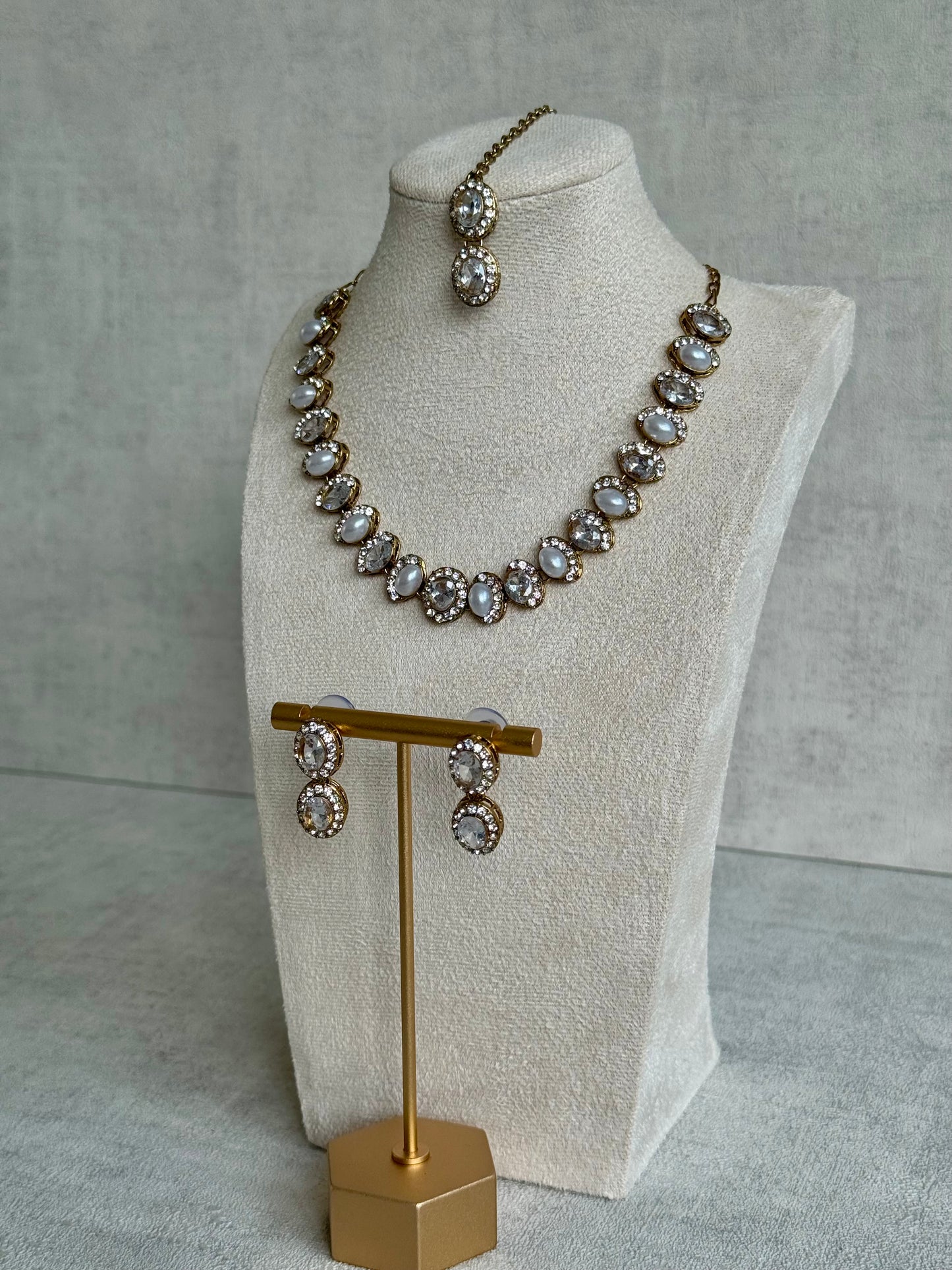 Ayura Designs Eira Set – Necklace, Earrings & Tikka with Diamond-Cut & Ivory Oval Stones in Antique Gold