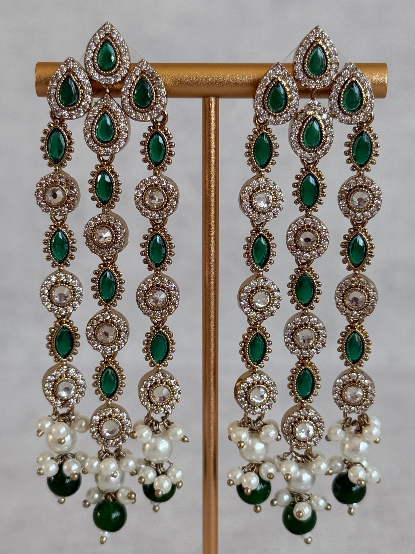 Ayura Designs Emilia Earrings – Gold Triple Strand Statement Earrings with Emerald Green Stones & Pearl Drops