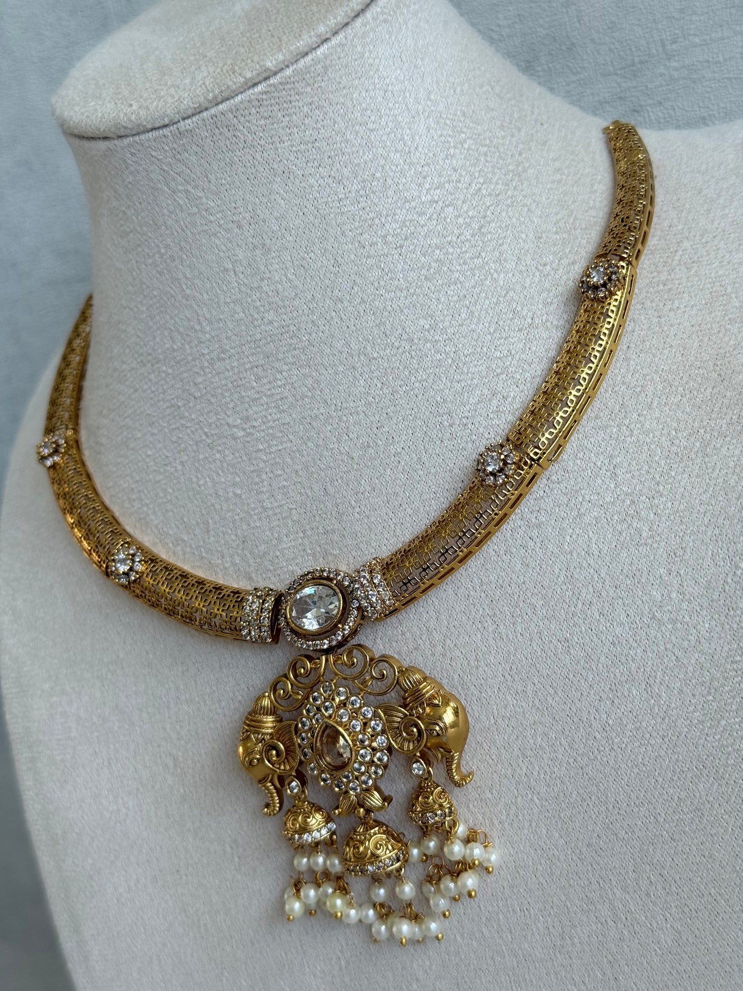 Ayura Designs Wadha Collar Necklace Set with Earrings – Gold Elephant Pendant & White Crystal Detailing