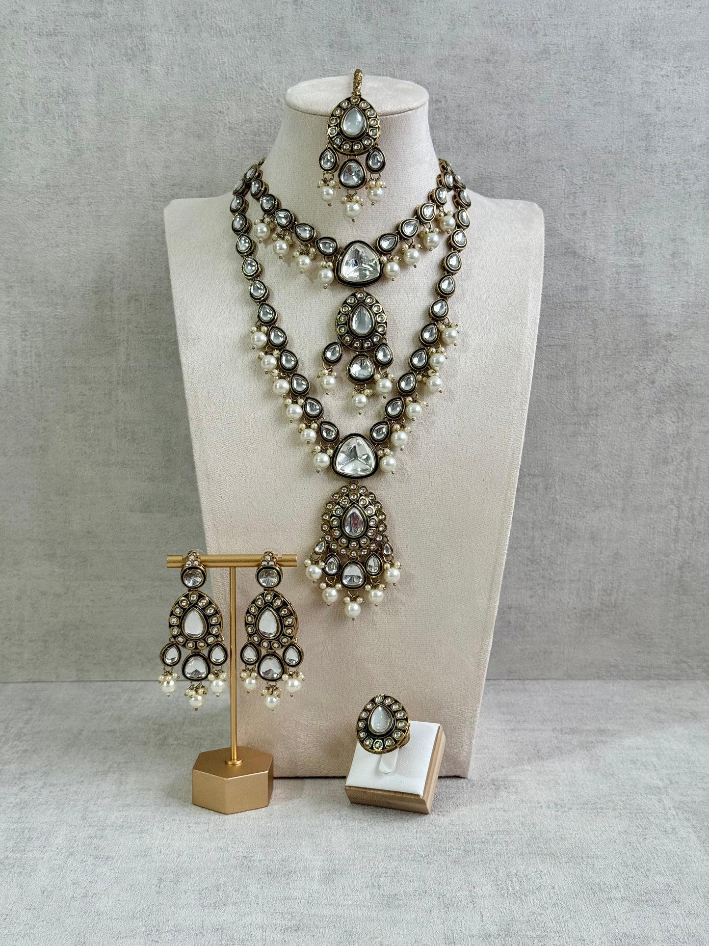 Ayura Designs Kalika Set with Necklace, Earrings, Tikka & Ring – Polki-Style Stones with Antique Green Enamel Detailing & Pearl Drops