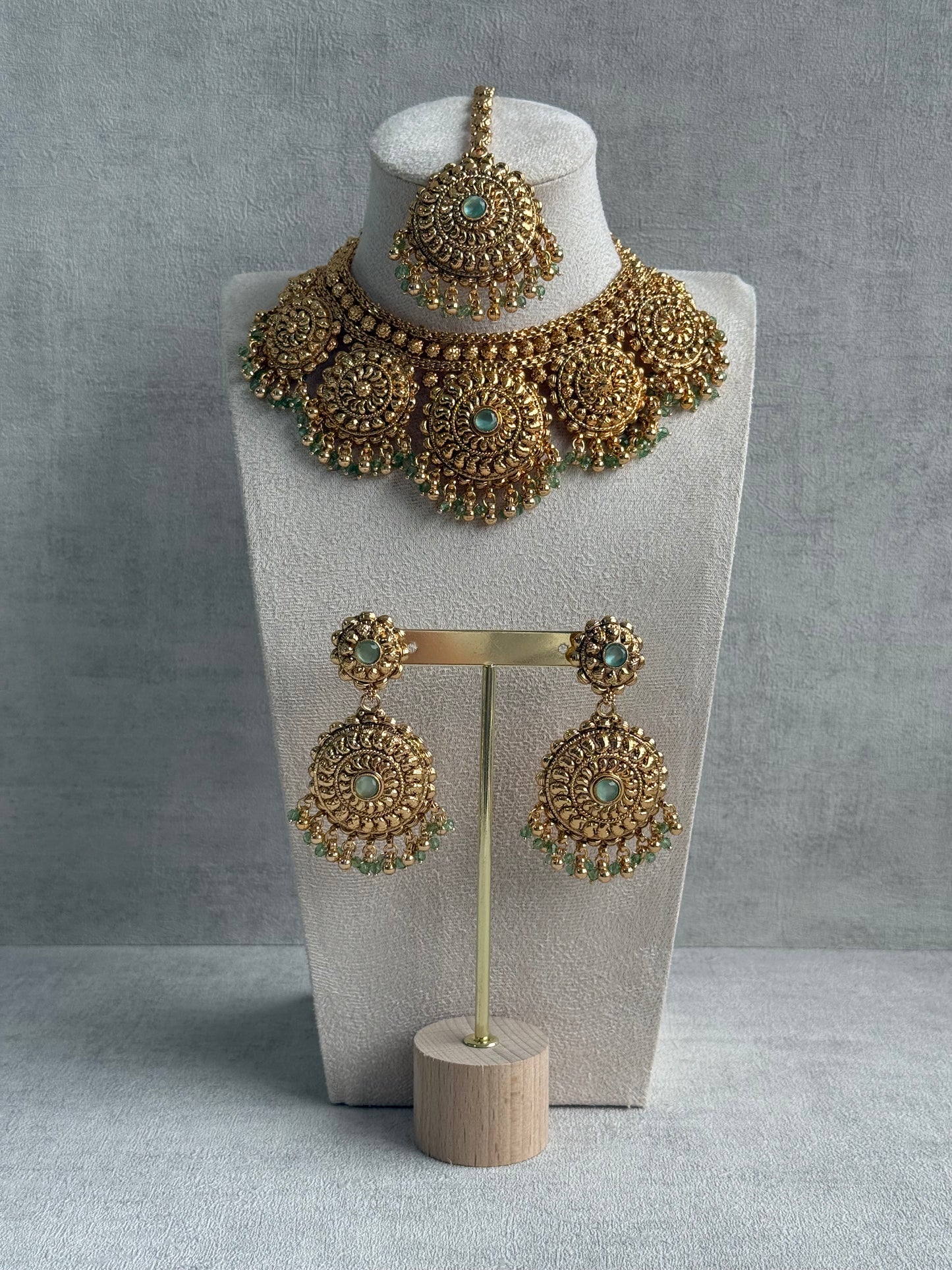 Ayura Designs Rummy Set – Statement Necklace, Earrings & Tikka with Pistachio Green Beads and Polished Gold Finish