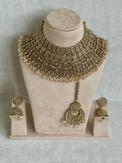 Ayura Designs Kismet Bridal Set with Necklace, Jhumkis & Tikka – in Champagne Stone & Pearl Detailing