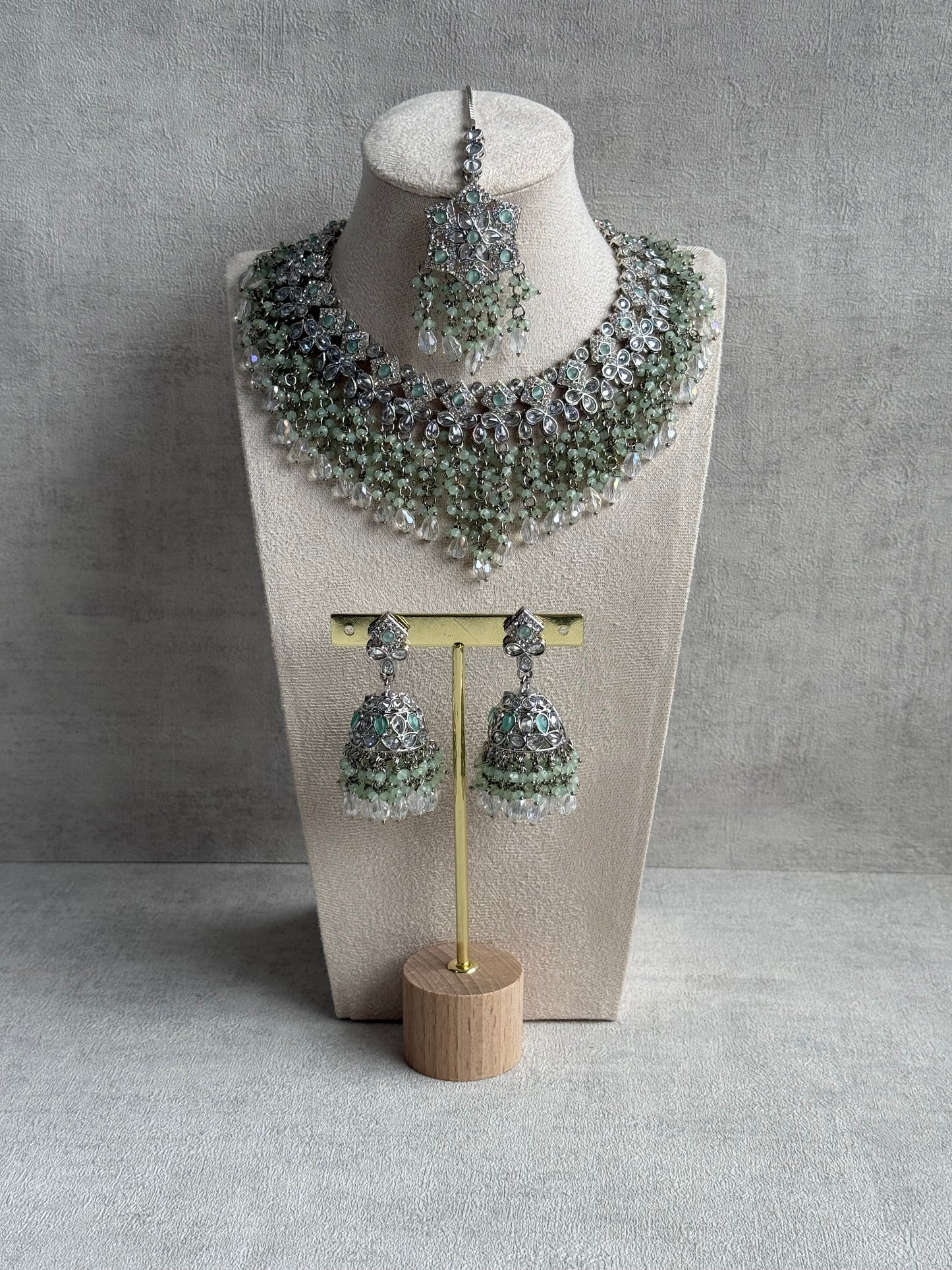 Ayura Designs Rayna Set – Necklace, Jhumkis & Tikka with Mint Green Beads, Mirror-Cut Stones & Silver Finish