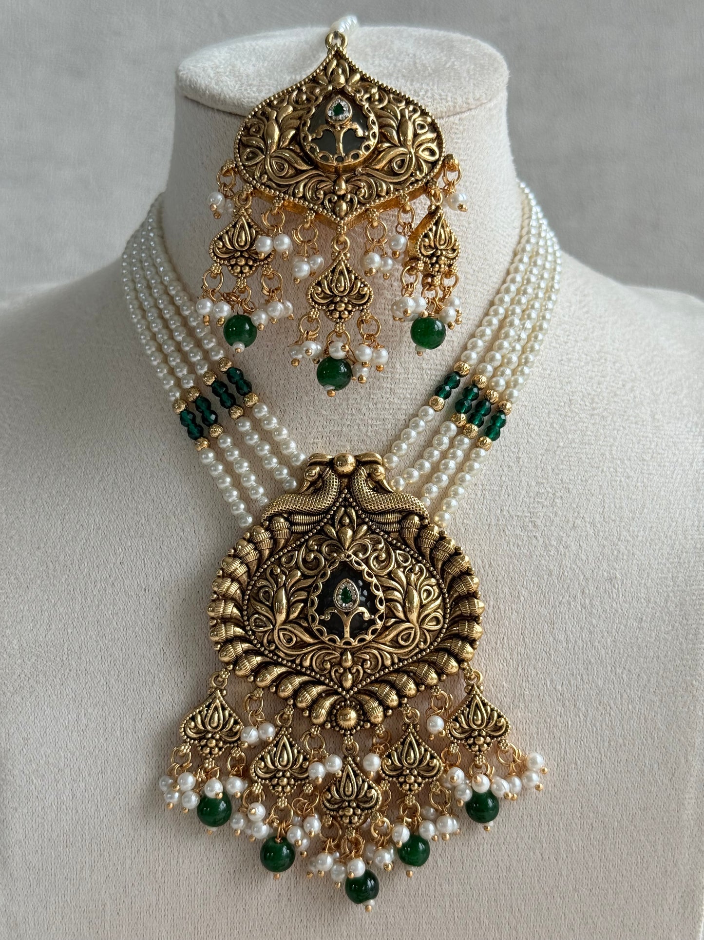 Ayura Designs Afia Necklace Set with Earrings & Tikka – Antique Gold, Emerald Green Beads, Green Centre Stone & Peacock Motifs