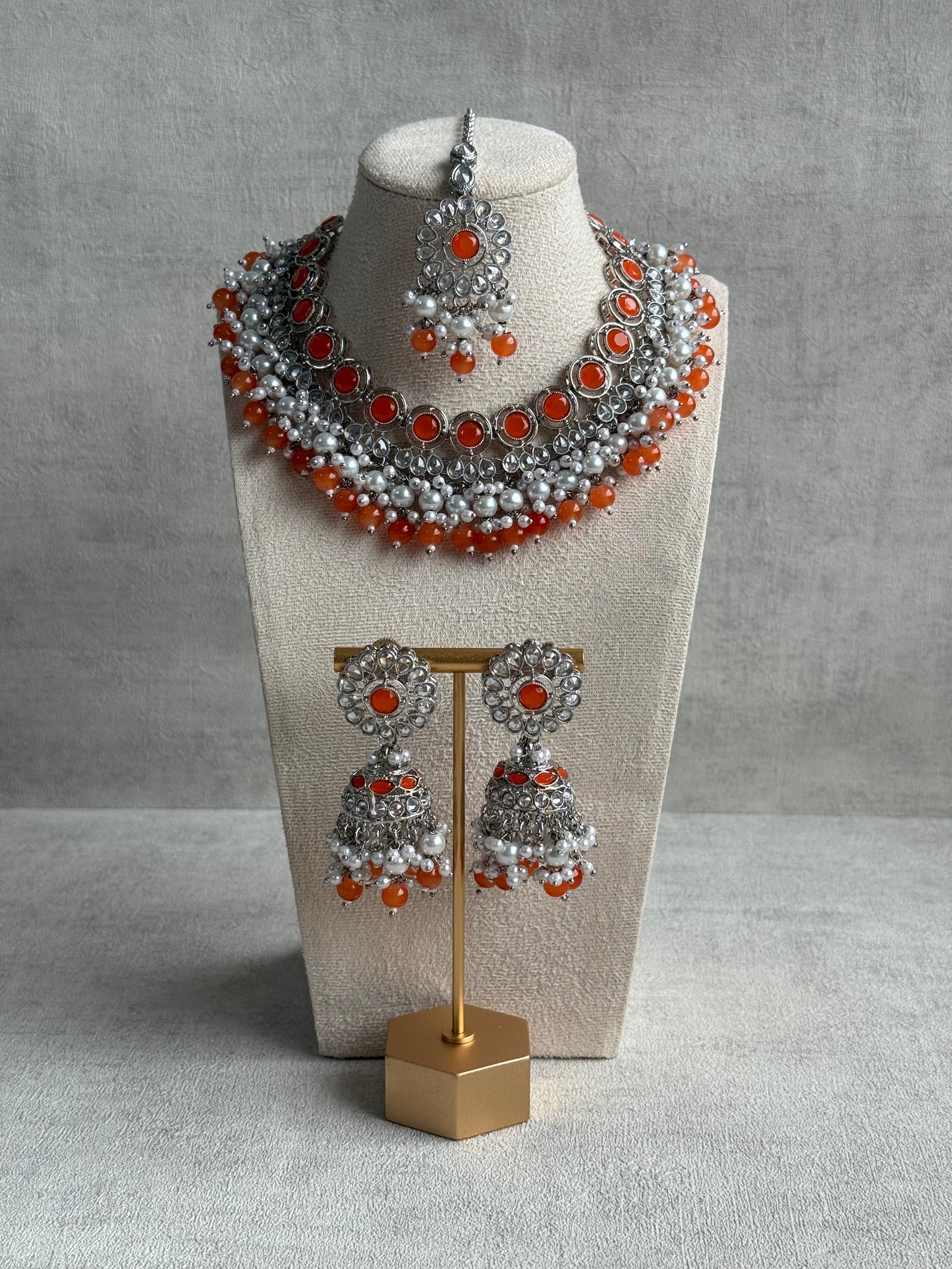 Ayura Designs Barira Set – Necklace, Jhumkis & Tikka with Orange Stones, Pearls & Antique Silver Finish