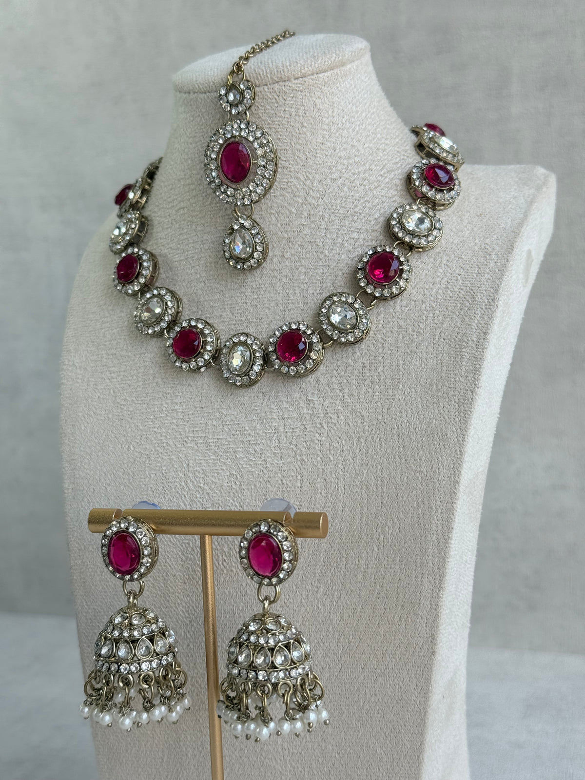 Ayura Designs Eira Necklace Set with Earrings & Tikka – Rani Pink & Crystal Stones with Antique Gold Finish