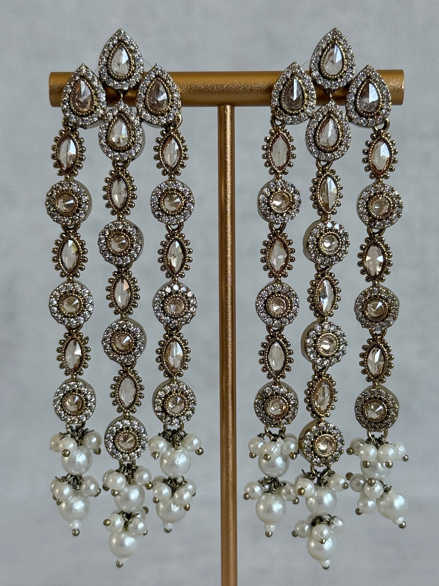 Ayura Designs Emilia Earrings – Gold Triple Strand Statement Earrings with Champagne Stones & Pearl Drops