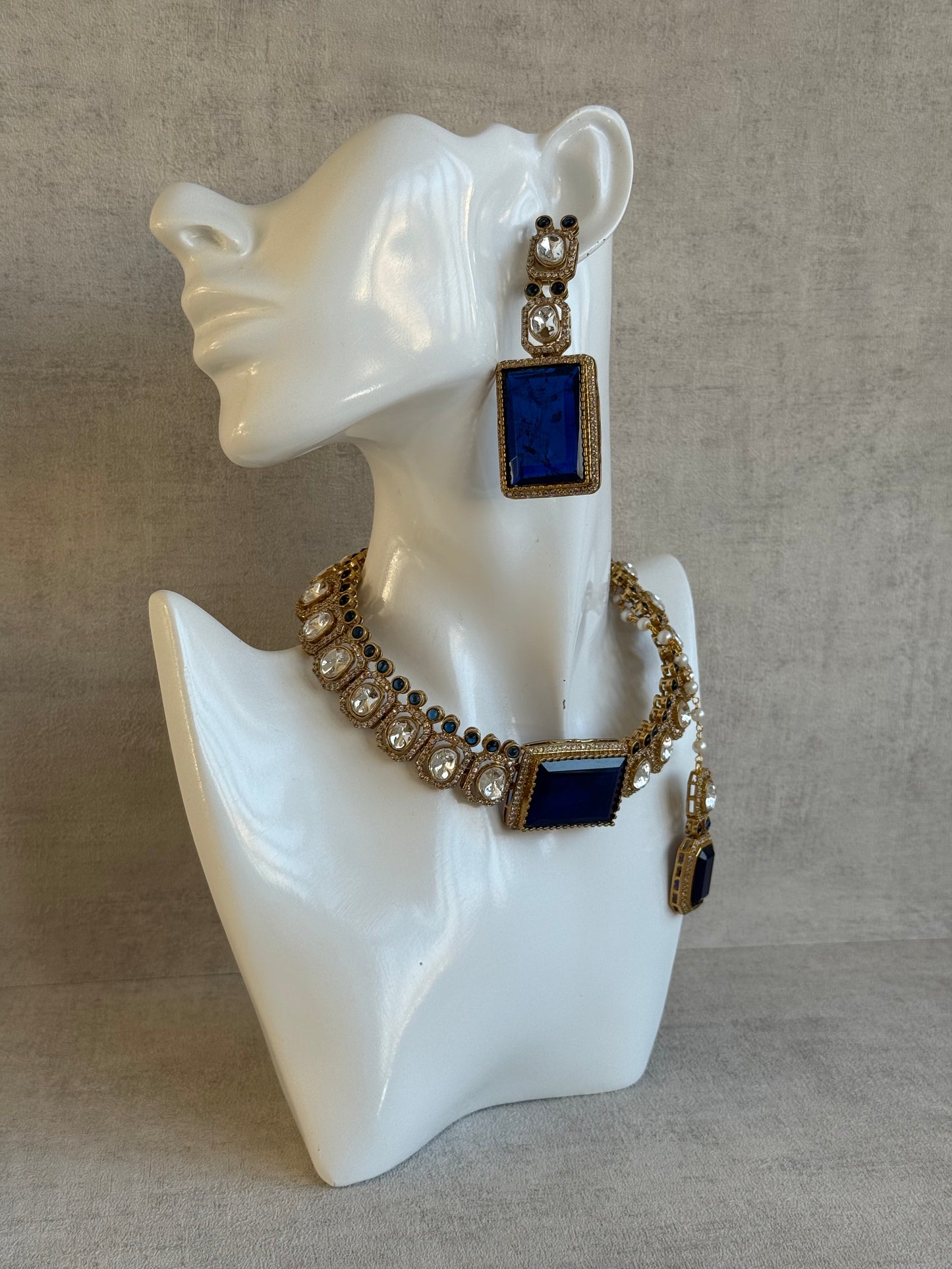 Ayura Designs Clara Set with Earrings & Tikka  – Royal Blue Stones with Moissanite and Antique Gold Finish