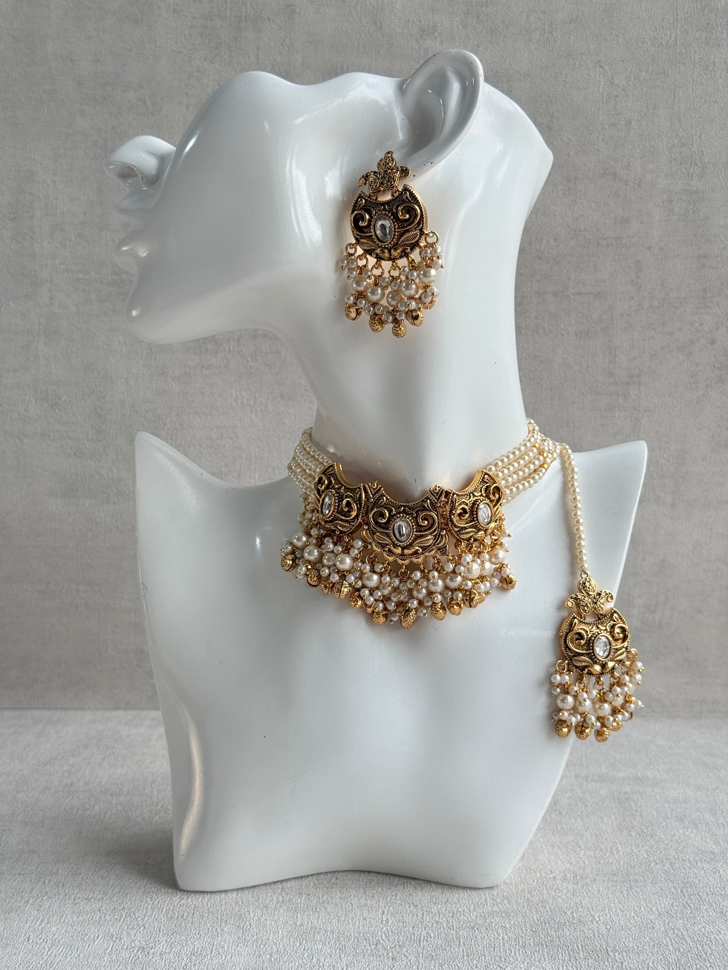 Ayura Designs Sneha Choker Set with Earrings & Tikka – Ivory Beads, Layered Pearl Detailing, Ghungroos & Antique Gold Finish