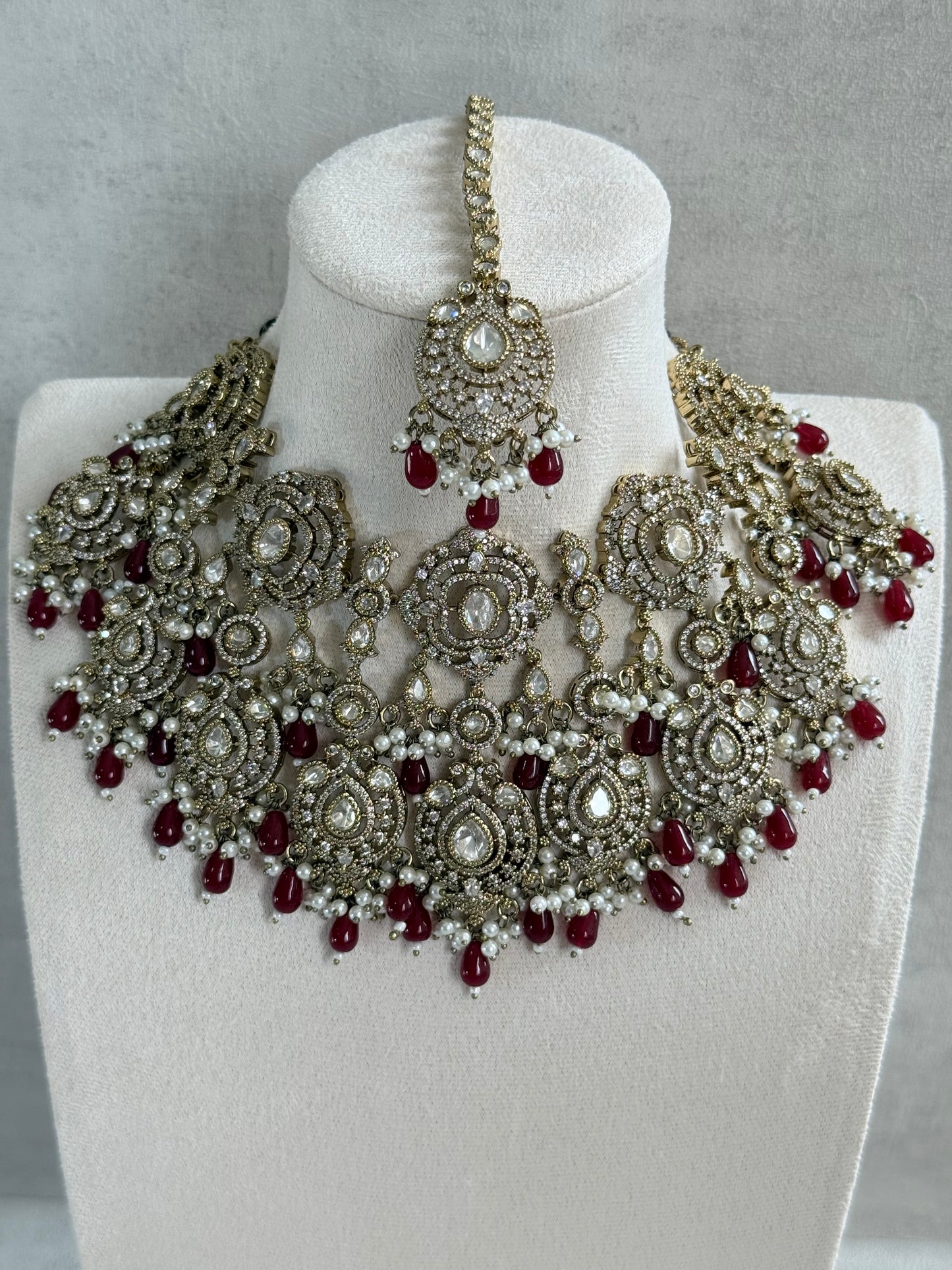 Ayura Designs Fazal Set with Necklace, Earrings & Tikka – Ruby Red Drops, Pearl Detailing & Moissanite Stonework