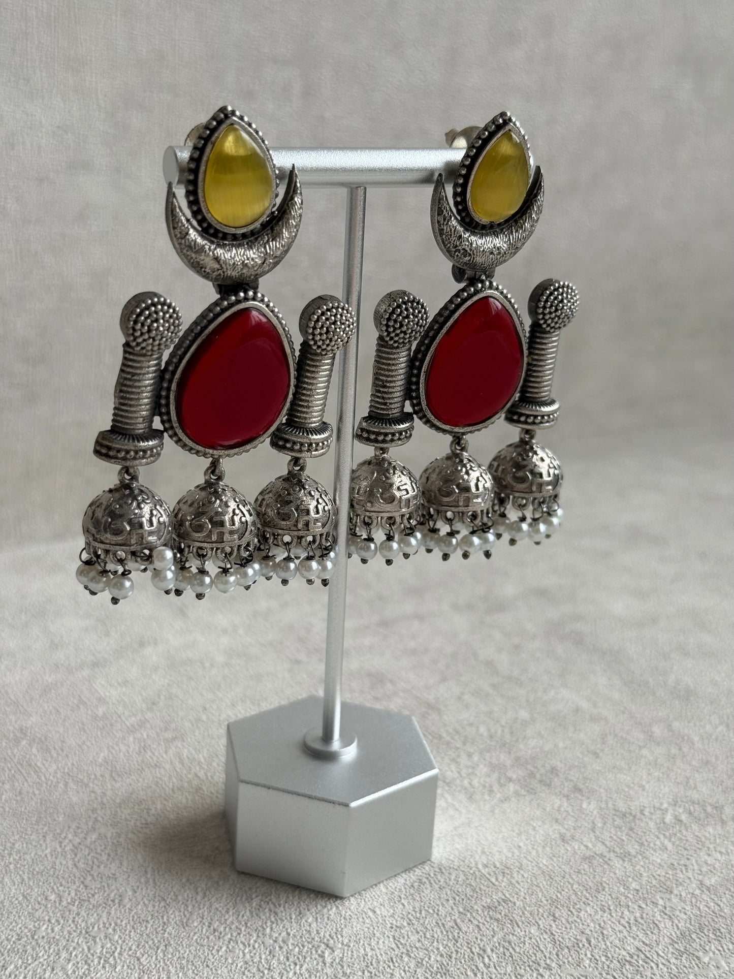 Ayura Designs Qissa Earrings – Oxidised Triple Jhumki Earrings with Ruby Red Stones & Pearl Detailing