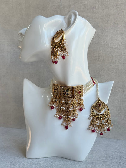 Ayura Designs Samera Choker Set with Earrings & Tikka – Rani Pink Beads, Pearl Detailing, Green Centre Stone, Floral Motifs & Antique Gold Finish