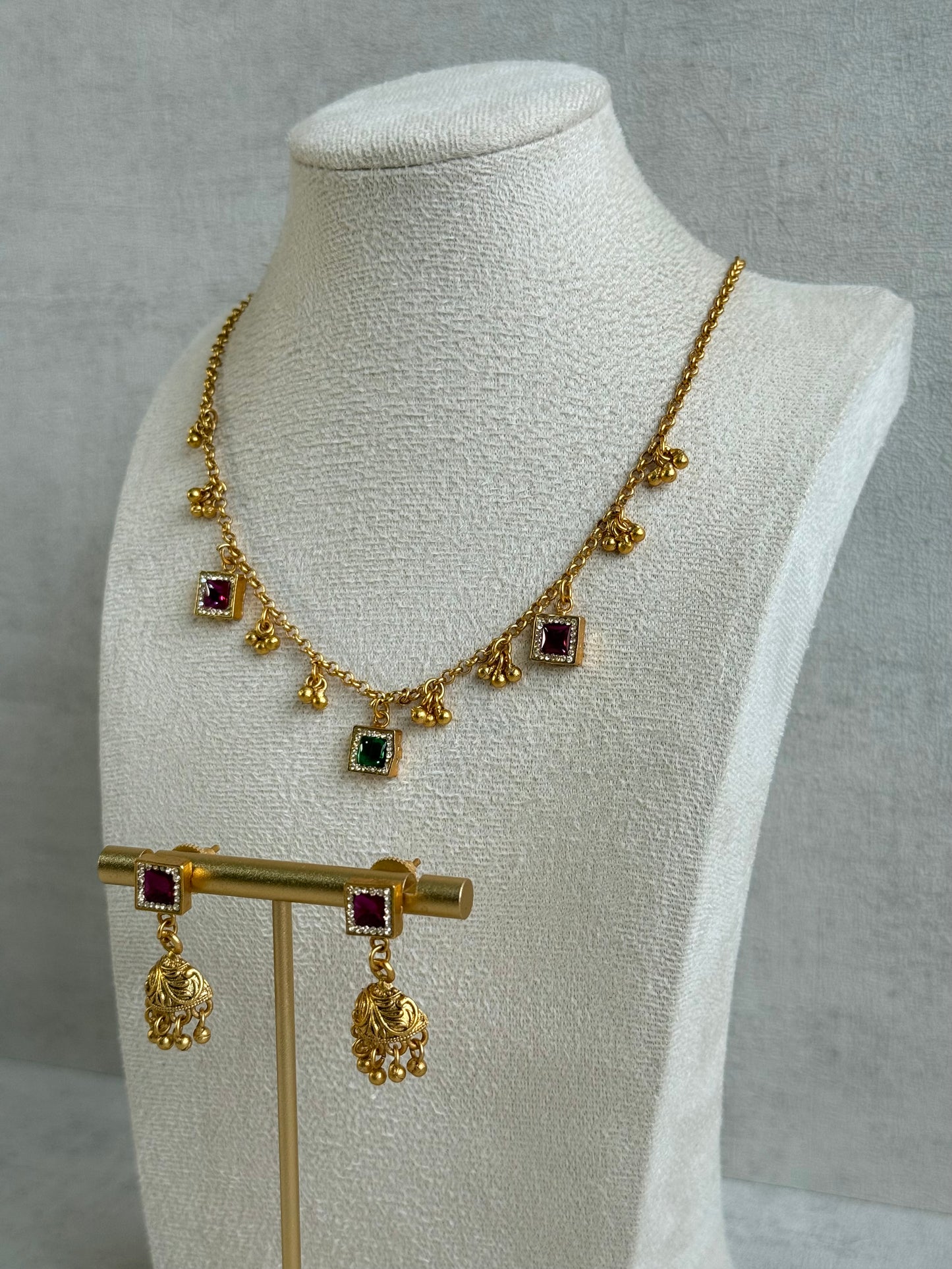 Ayura Designs Smita Set with Necklace & Earrings – Ruby Pink & Emerald Green Stones with Gold-Tone Ghungroo Detailing