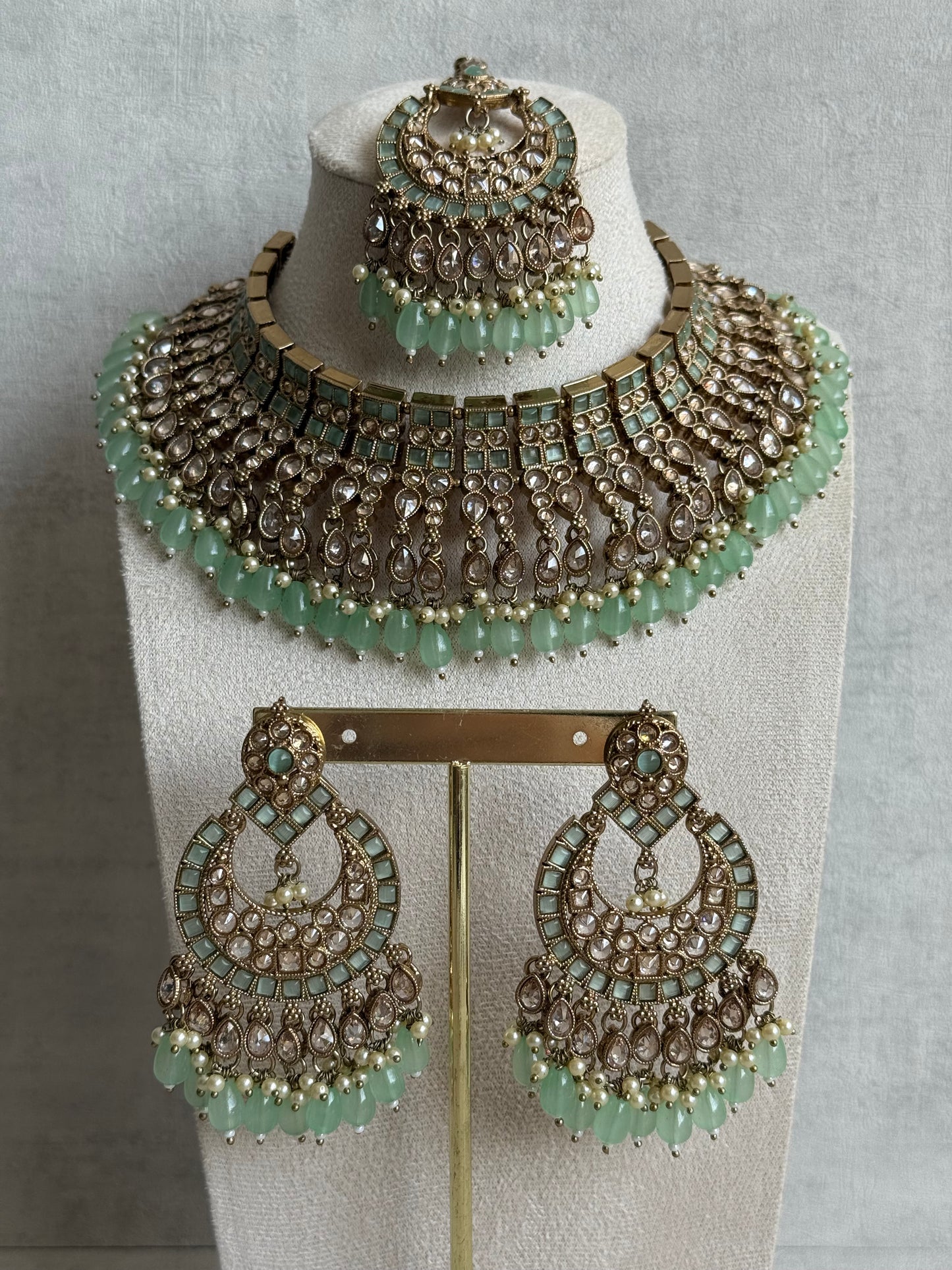 Ayura Designs Sajda Bridal Set with Necklace, Earrings, Tikka & Passa – Pistachio Green Beads, Kundan & Mirror-Cut Detailing