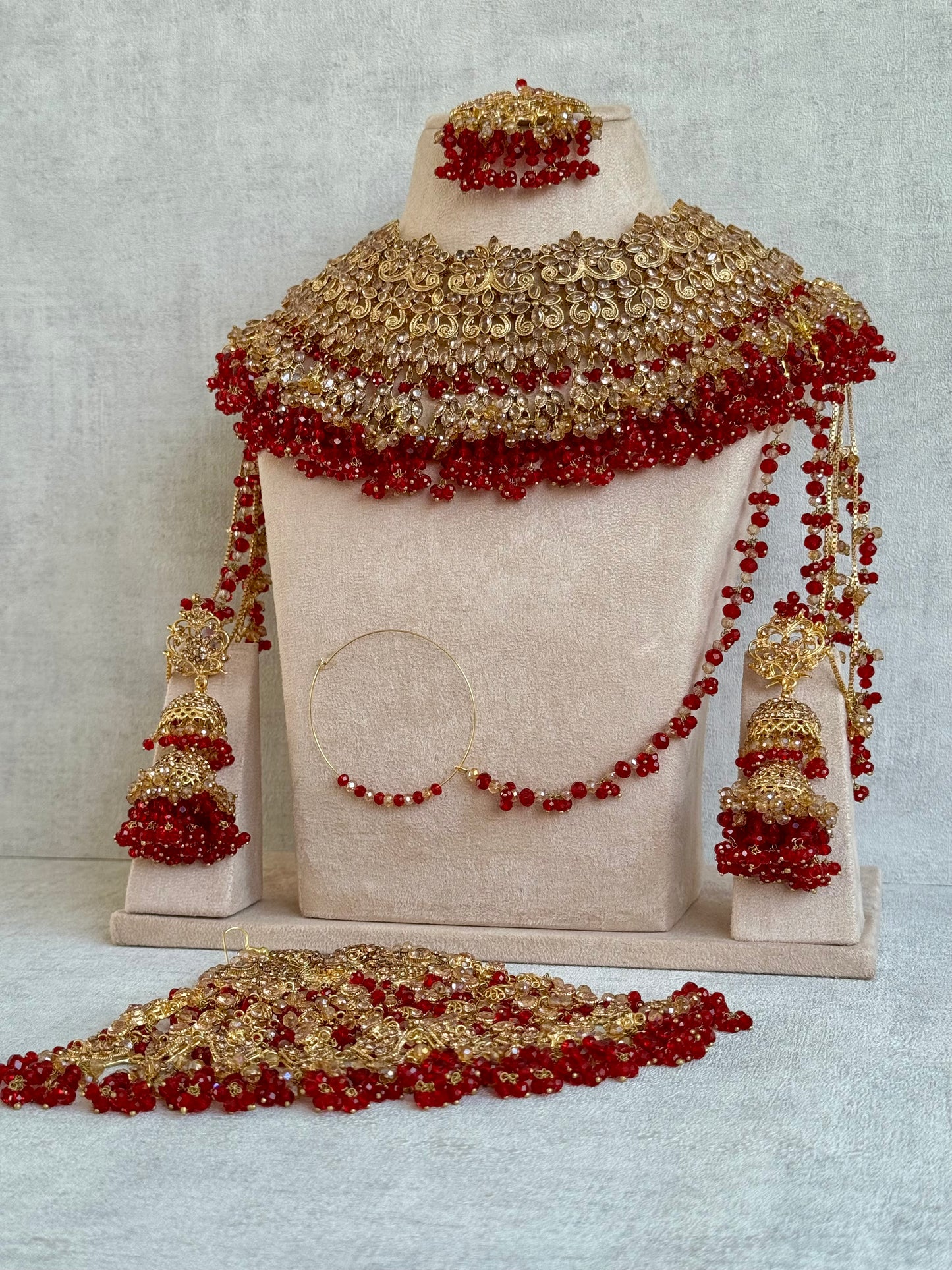 Ayura Designs Ishqiya Bridal Set with Necklace, Jhumkis with Sahare, Tikka & Jhoomer – Antique Gold, Champagne Stones & Red Bead Detailing