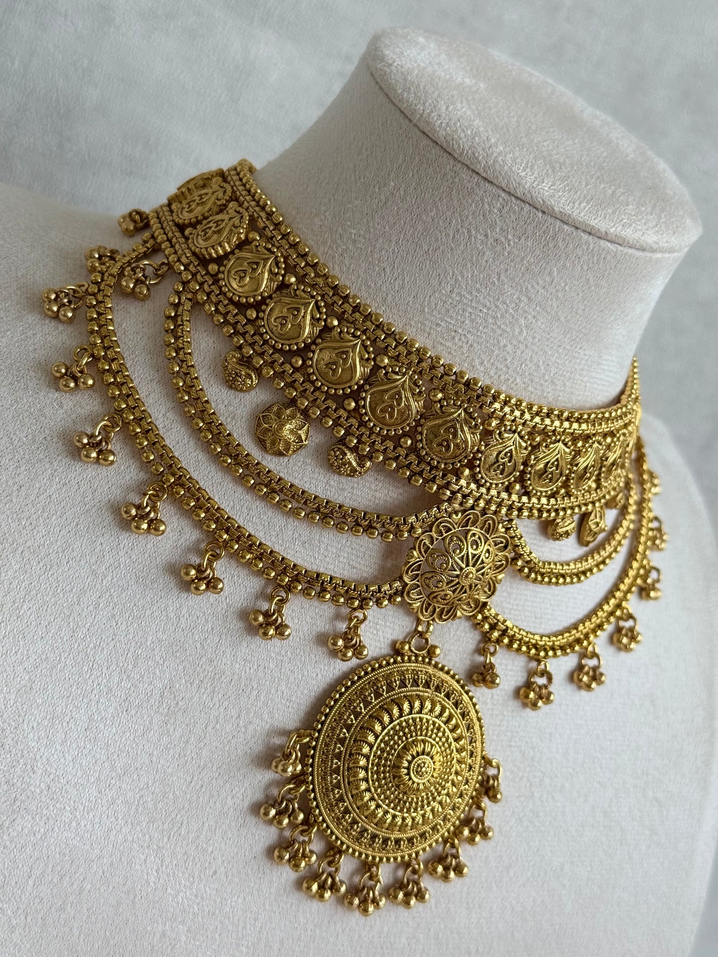 Ayura Designs Subha Choker Set with Earrings & Passa – Antique Gold Engraved Medallions, Layered Chains & Ghungroo Drops
