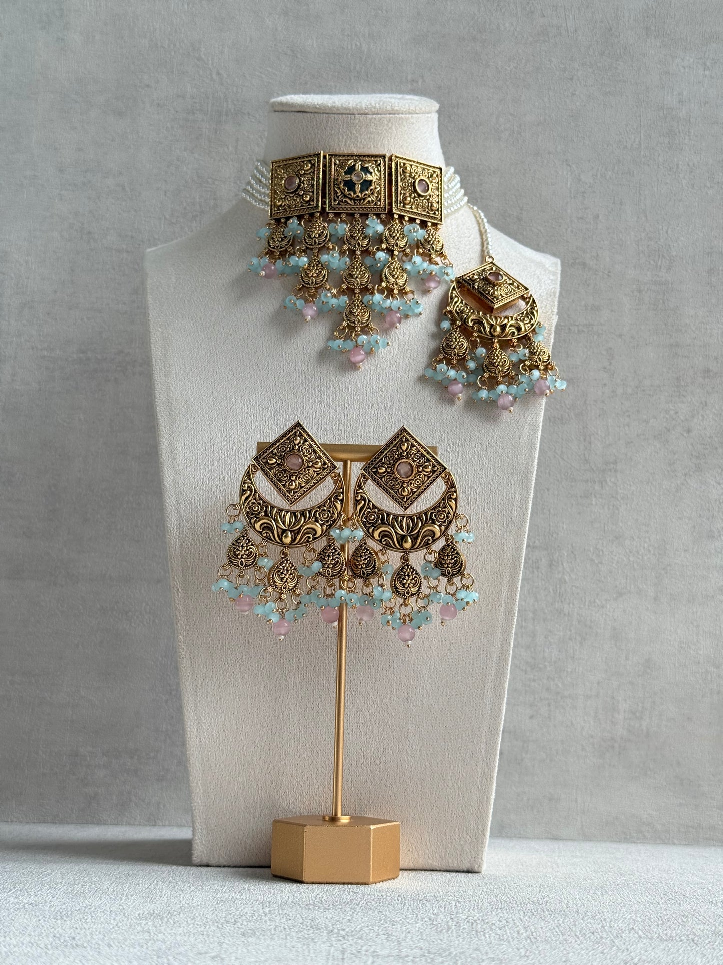 Ayura Designs Samera Choker Set with Earrings & Tikka – Aqua Blue & Blush Pink Beads, Green Centre Stone, Floral Motifs & Antique Gold Finish