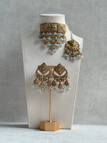 Ayura Designs Samera Choker Set with Earrings & Tikka – Aqua Blue & Blush Pink Beads, Green Centre Stone, Floral Motifs & Antique Gold Finish