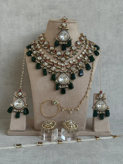 Ayura Designs Malika Bridal Set with Necklace, Jhumkis, Tikka, Nath, Ring & Sheeshphool – Jadau Kundan Craftsmanship with Mirror-Cut Polki, Emerald Green Drops, Ruby Accents & Antique Gold Finish