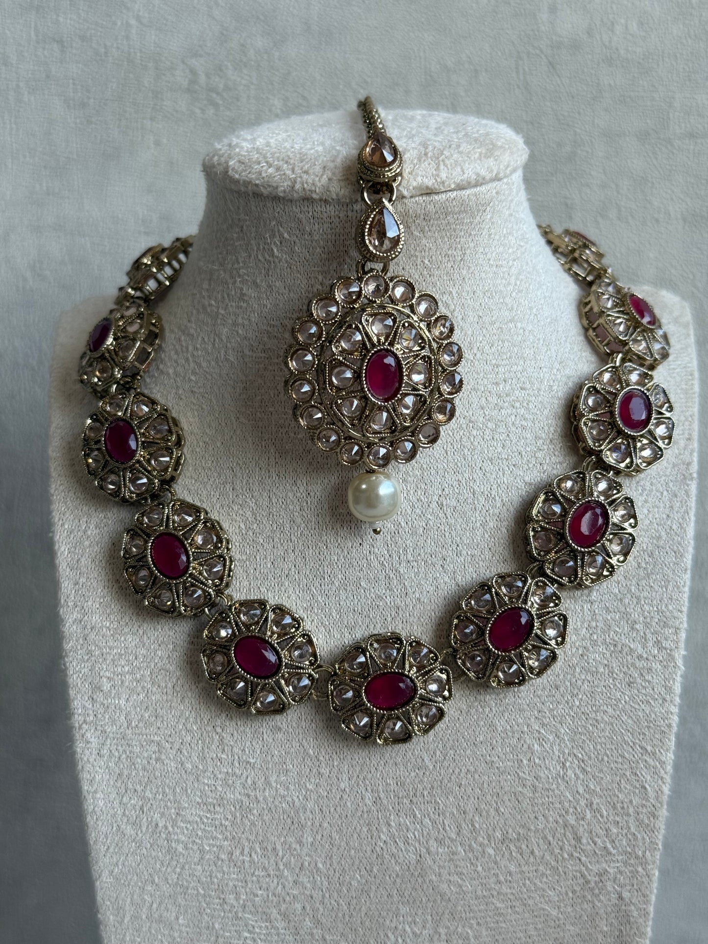 Ayura Designs Sania Set with Necklace, Earrings & Tikka – Ruby Red Stones, Kundan Detailing & Antique Gold Finish