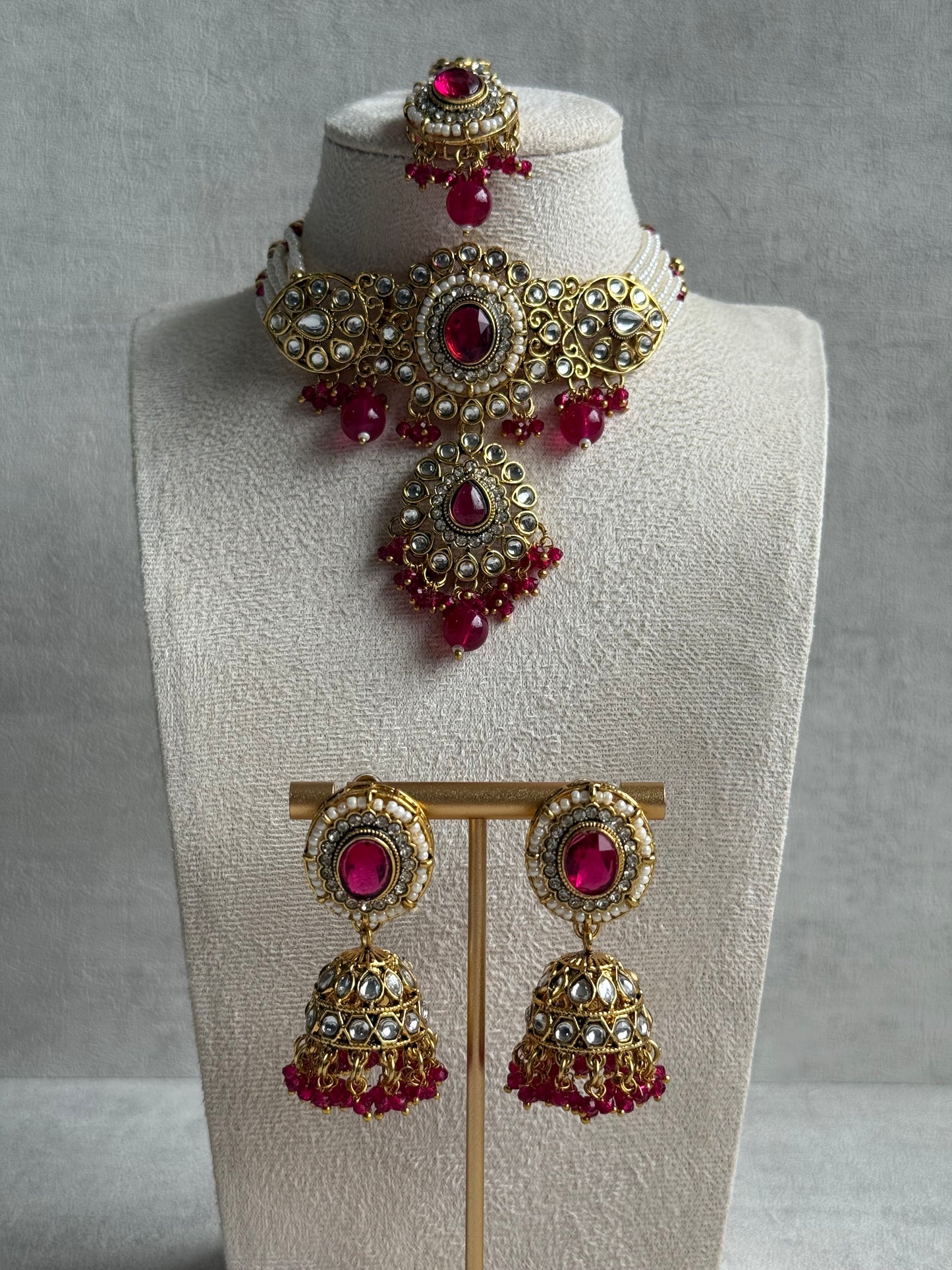 Ayura Designs Muskaan Set – Choker, Jhumkis & Tikka with Fuchsia Beads, Kundan Stones & Antique Gold Finish