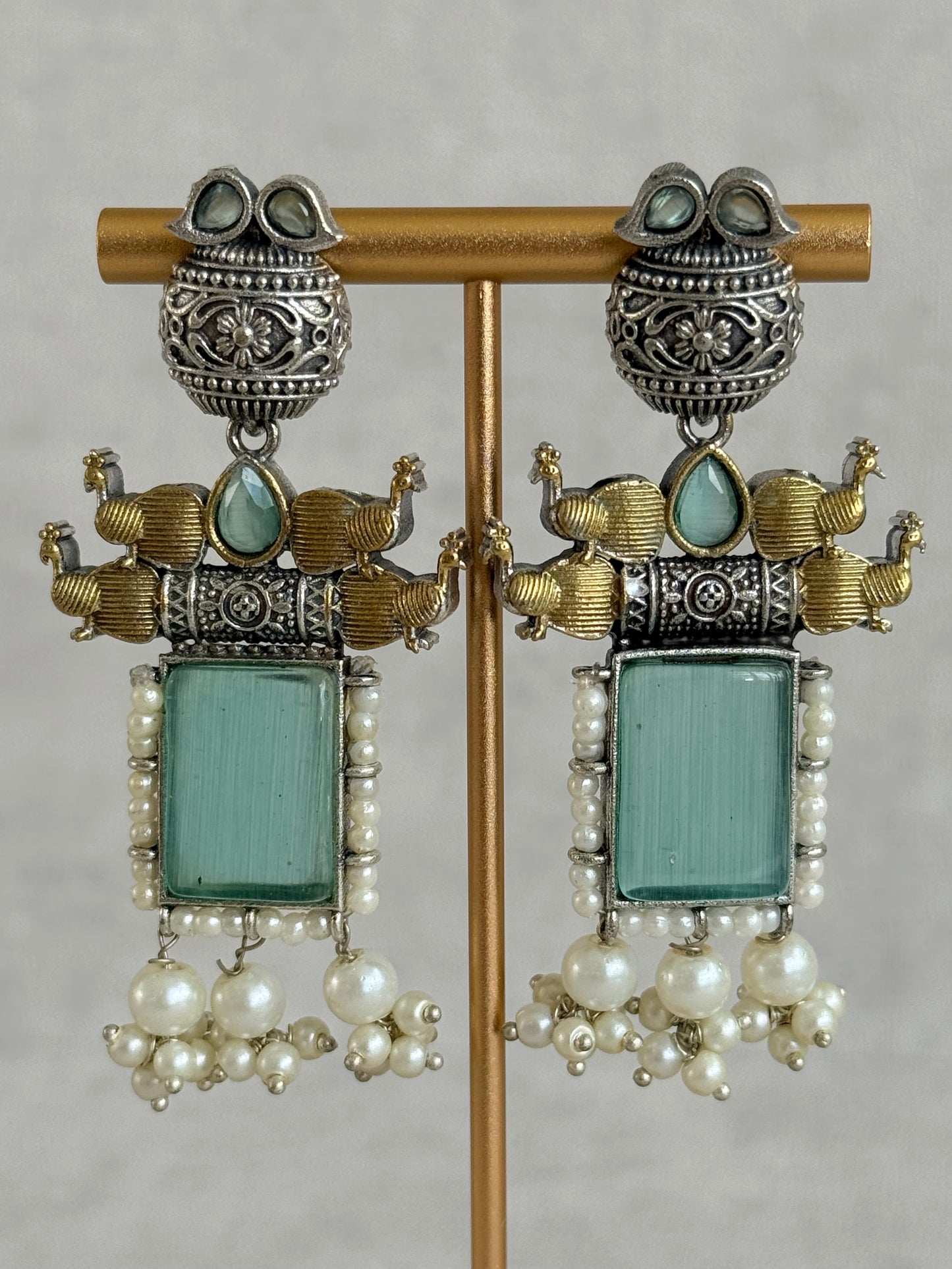 Ayura Designs Khaak Earrings – Oxidised Statement Earrings with Peacock Motifs, Aqua Green Stones & Pearl Clusters