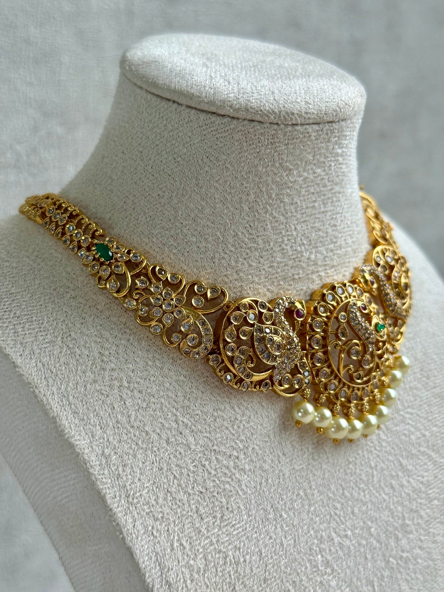 Ayura Designs Vedya Set – Antique Gold Peacock Necklace with Kundan, Emerald & Pearl Detailing