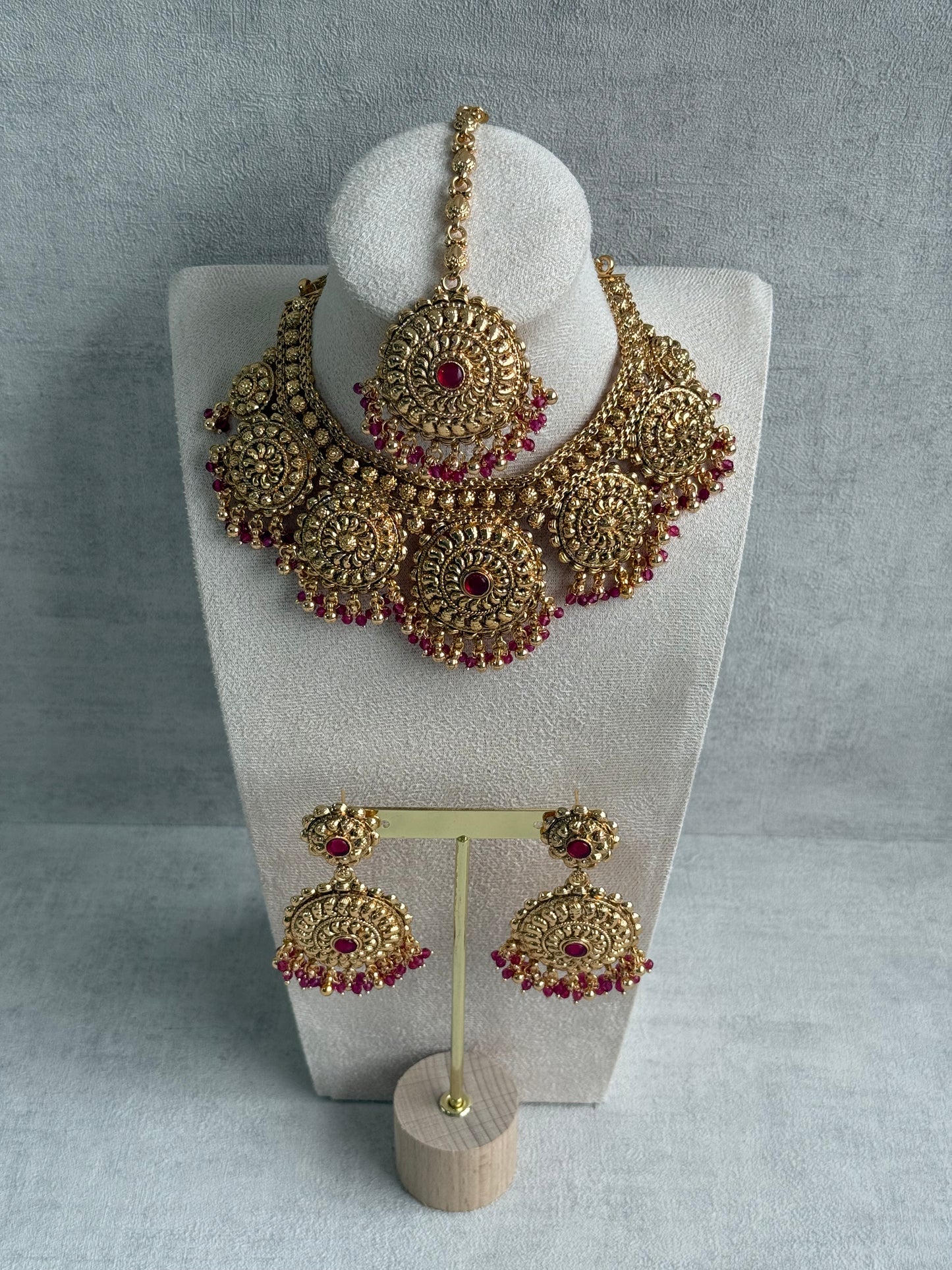 Ayura Designs Rummy Set – Statement Necklace, Earrings & Tikka with Rani Pink Beads and Polished Gold Finish