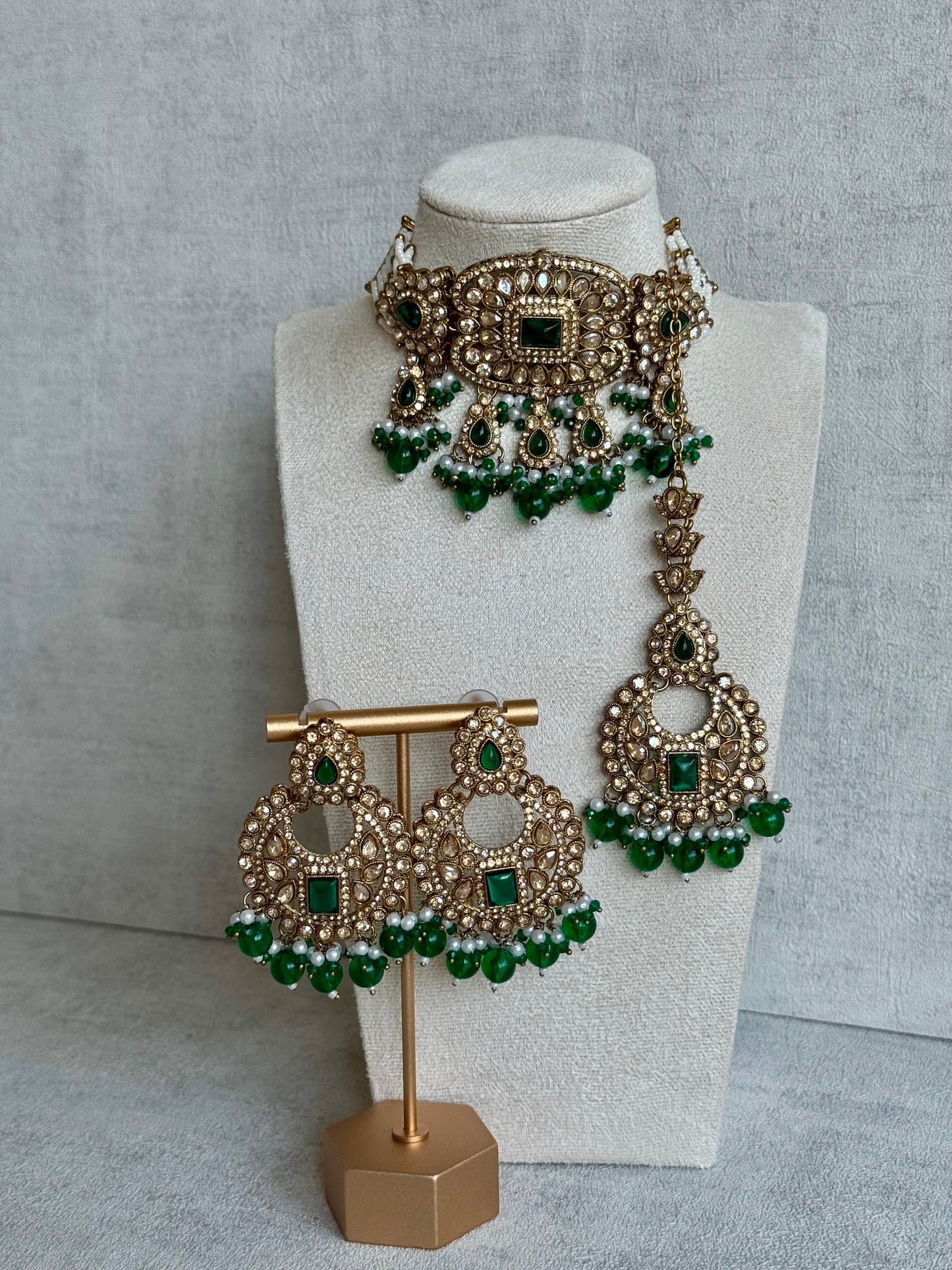 Ayura Designs Arzoo Set with Earrings & Tikka – Antique Gold Finish with Champagne Stones, Emerald Green Accents & Pearl Detailing