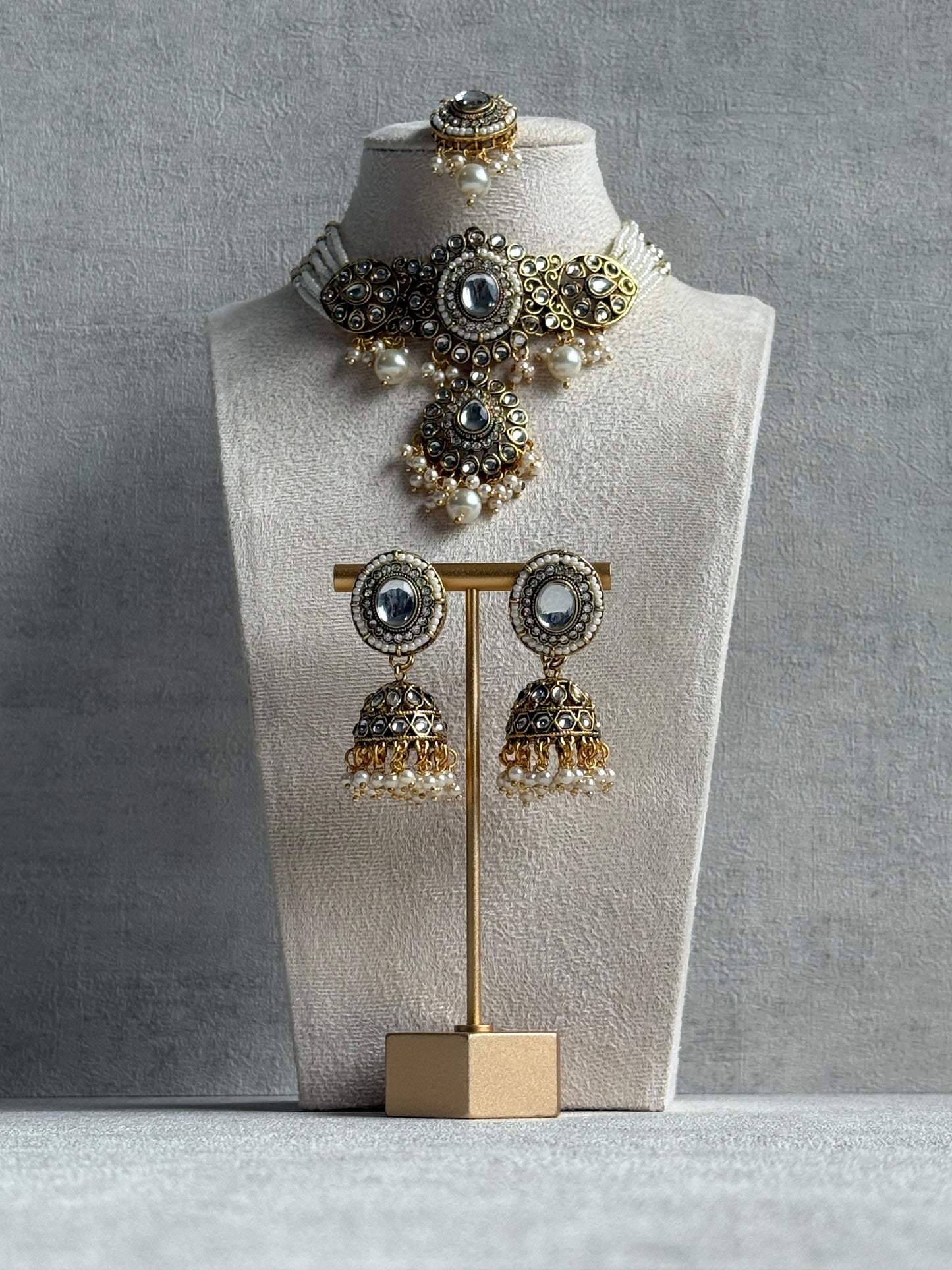 Ayura Designs Muskaan Set – Choker, Jhumkis & Tikka with Ivory Pearls, Mirror-Cut Kundan Stones & Antique Gold Finish