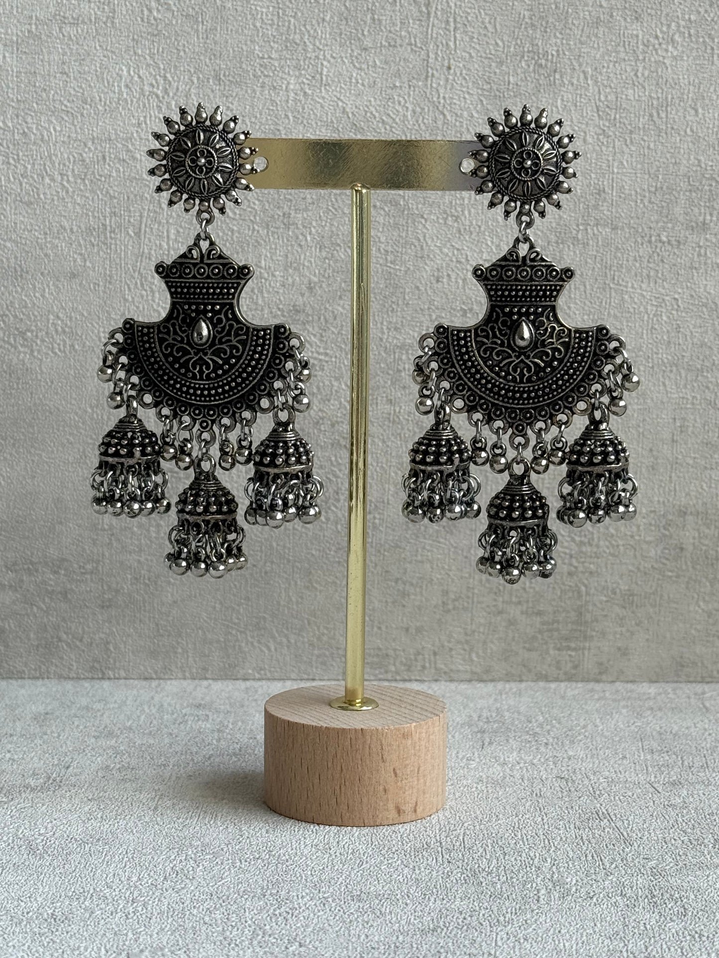 Ayura Designs Mahfar Earrings – Oxidised Silver Jhumkas with Sunburst Tops & Triple Dome Drops