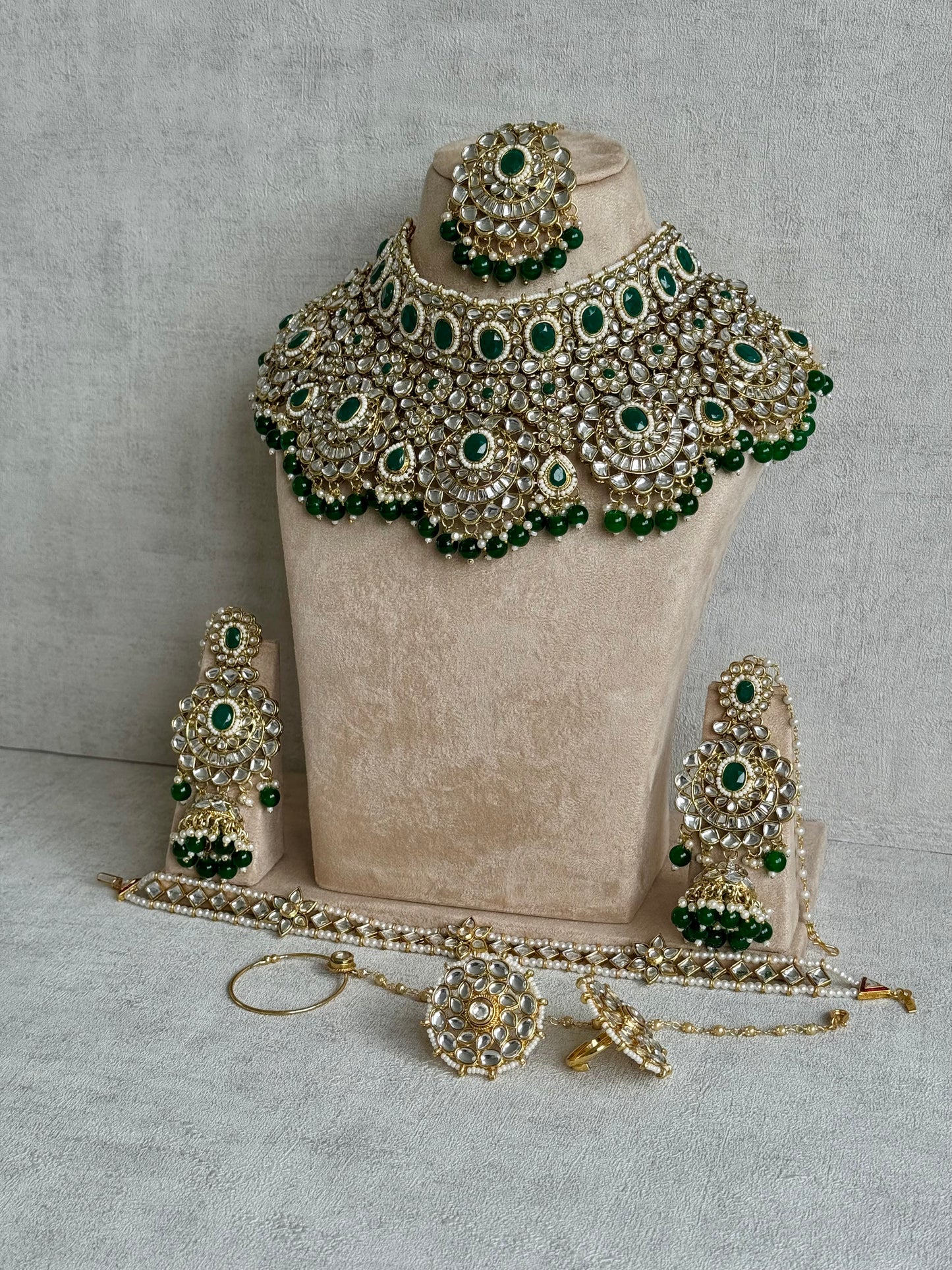 Ayura Designs Meherbano Bridal Set with Necklace, Jhumkis, Tikka, Nath, Ring & Sheeshphool – Jadau Kundan Craftsmanship with Mirror-Cut Polki, Emerald Green Stones & Antique Gold Finish