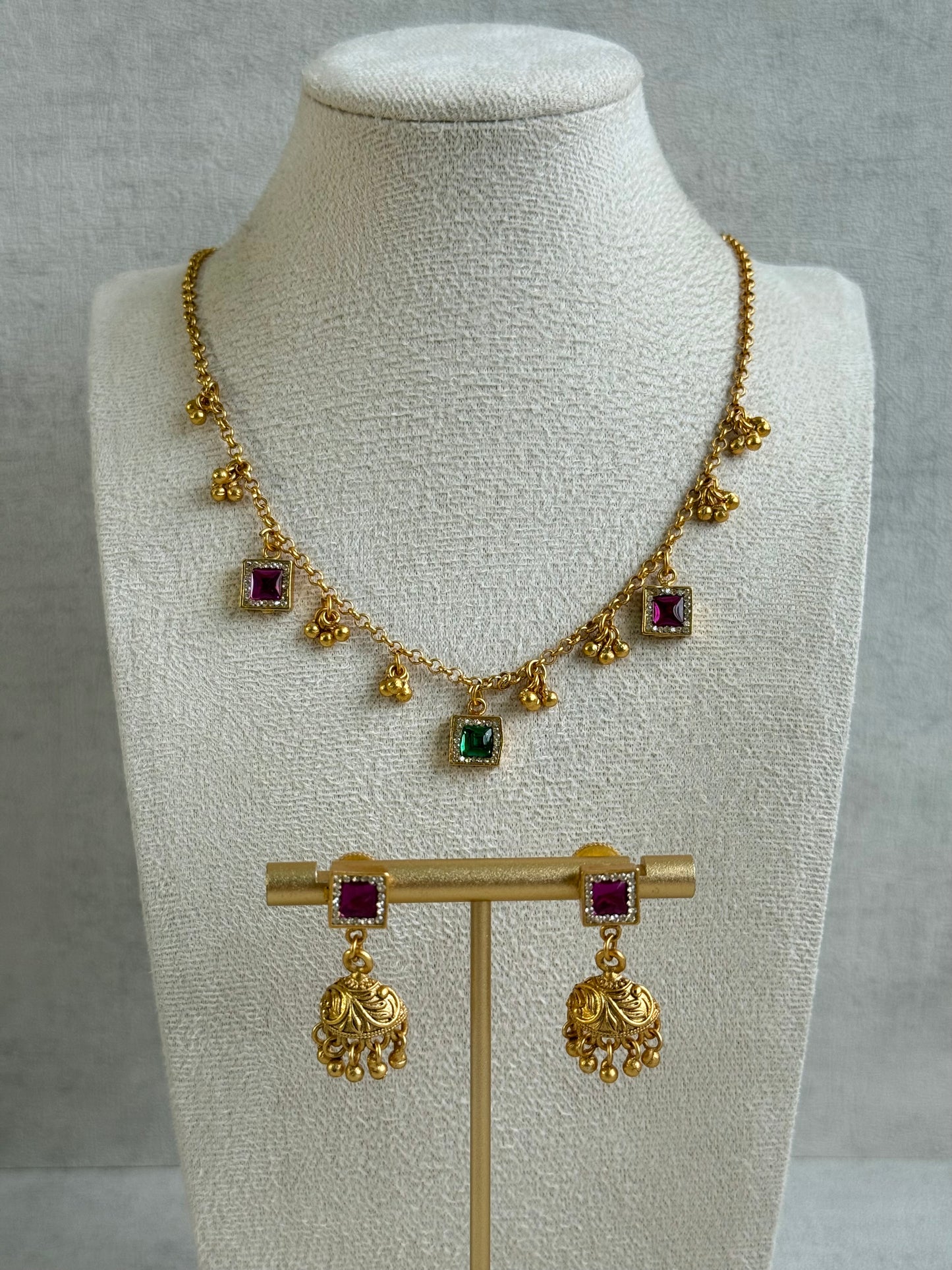 Ayura Designs Smita Set with Necklace & Earrings – Ruby Pink & Emerald Green Stones with Gold-Tone Ghungroo Detailing