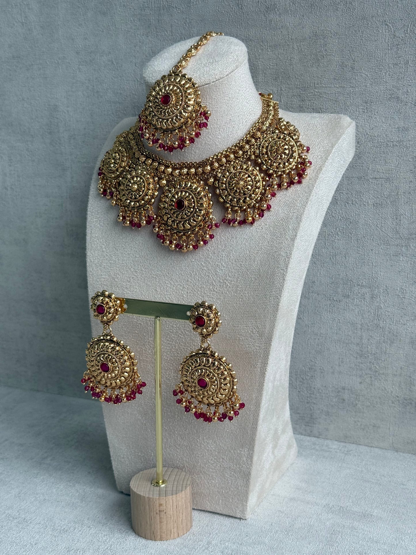 Ayura Designs Rummy Set – Statement Necklace, Earrings & Tikka with Rani Pink Beads and Polished Gold Finish