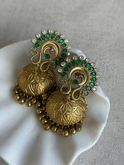 Ayura Designs Moraya Jhumkis – Emerald Green Peacock Motif with Antique Gold Detailing