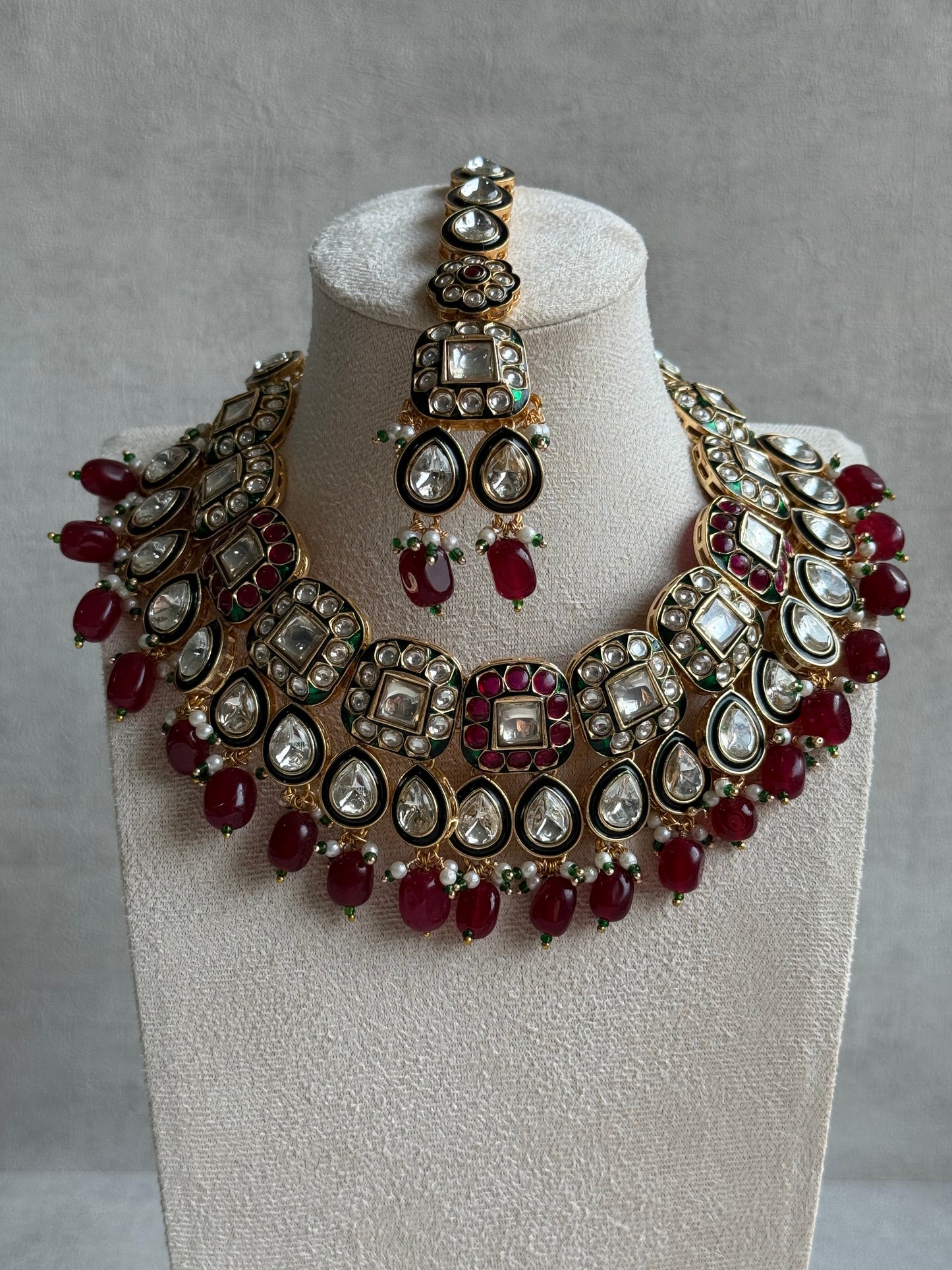 Ayura Designs Salma Set – Necklace, Earrings & Tikka with Mirror-Cut Kundan, Ruby Red Beads, Emerald Green Meenakari & Gold Finish