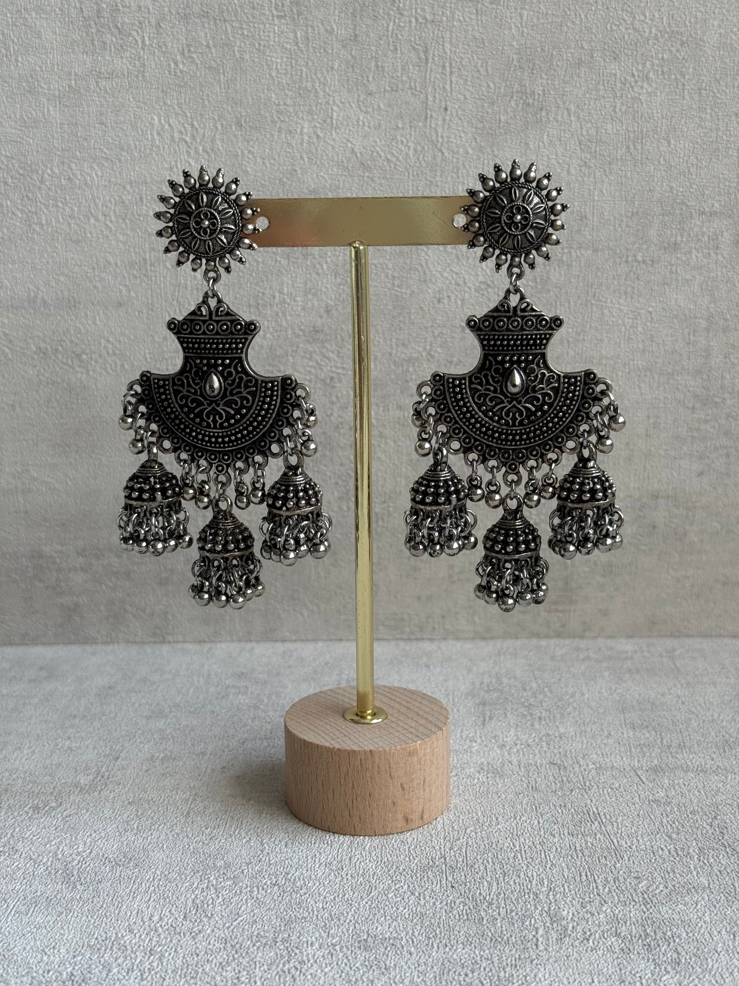 Ayura Designs Mahfar Earrings – Oxidised Silver Jhumkas with Sunburst Tops & Triple Dome Drops