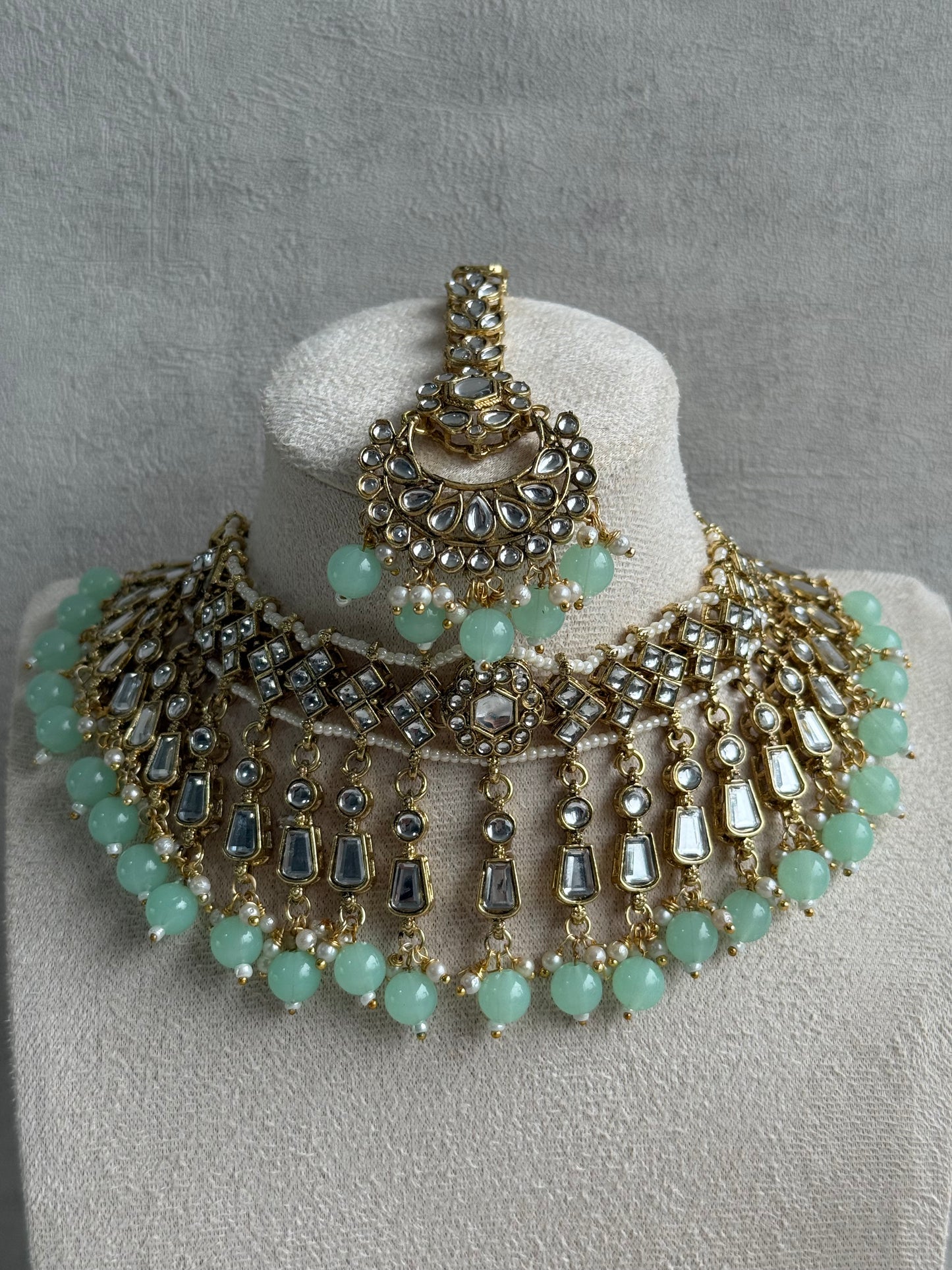 Ayura Designs Shaheen Set with Jhumkis & Tikka – Pistachio Green Beads, Mirror Kundan & Gold Finish